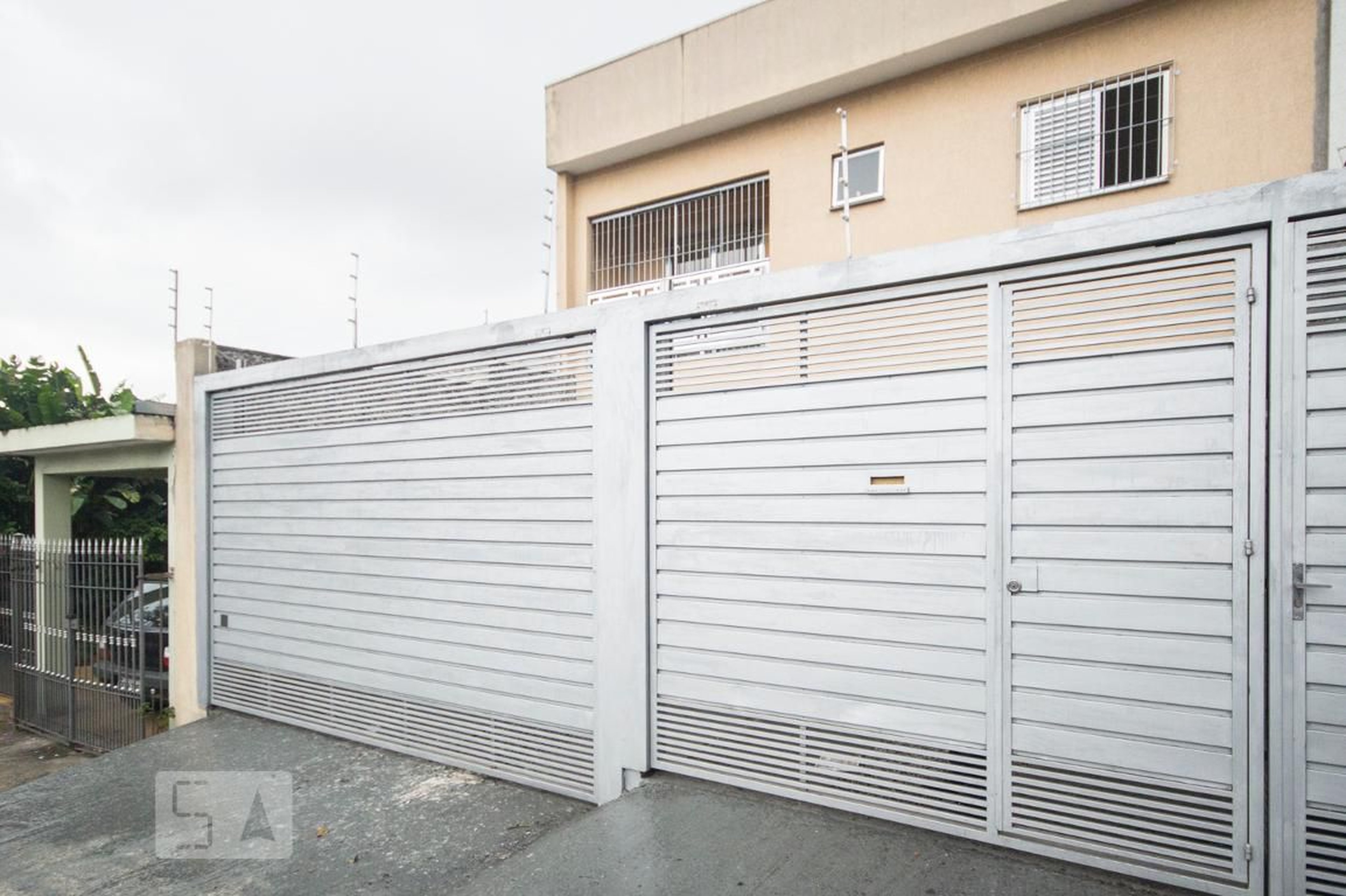 Fachada Condomínio em Rua Pereira Estéfano, 276