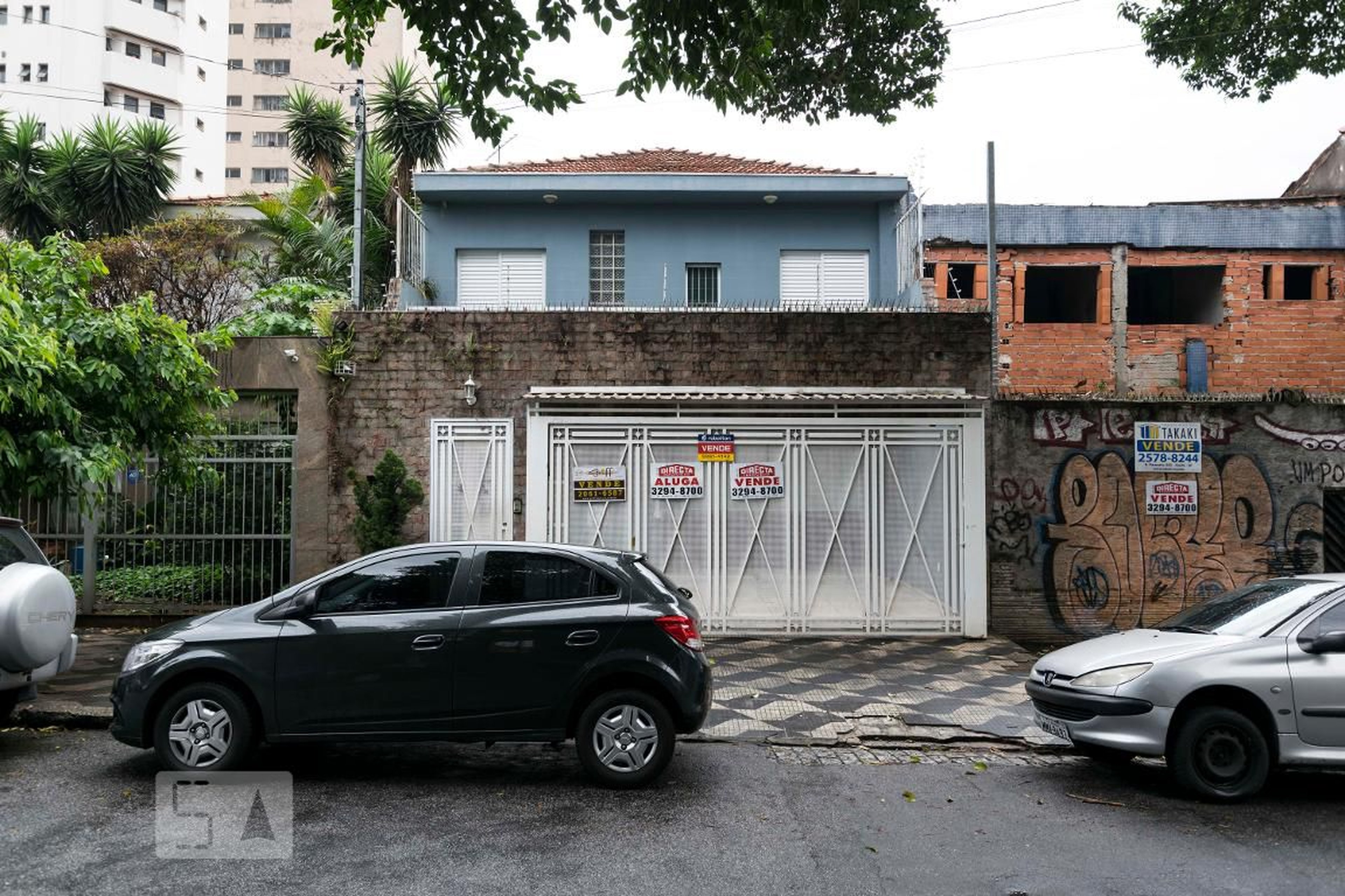 Fachada Condomínio em Rua Heitor Peixoto, 207
