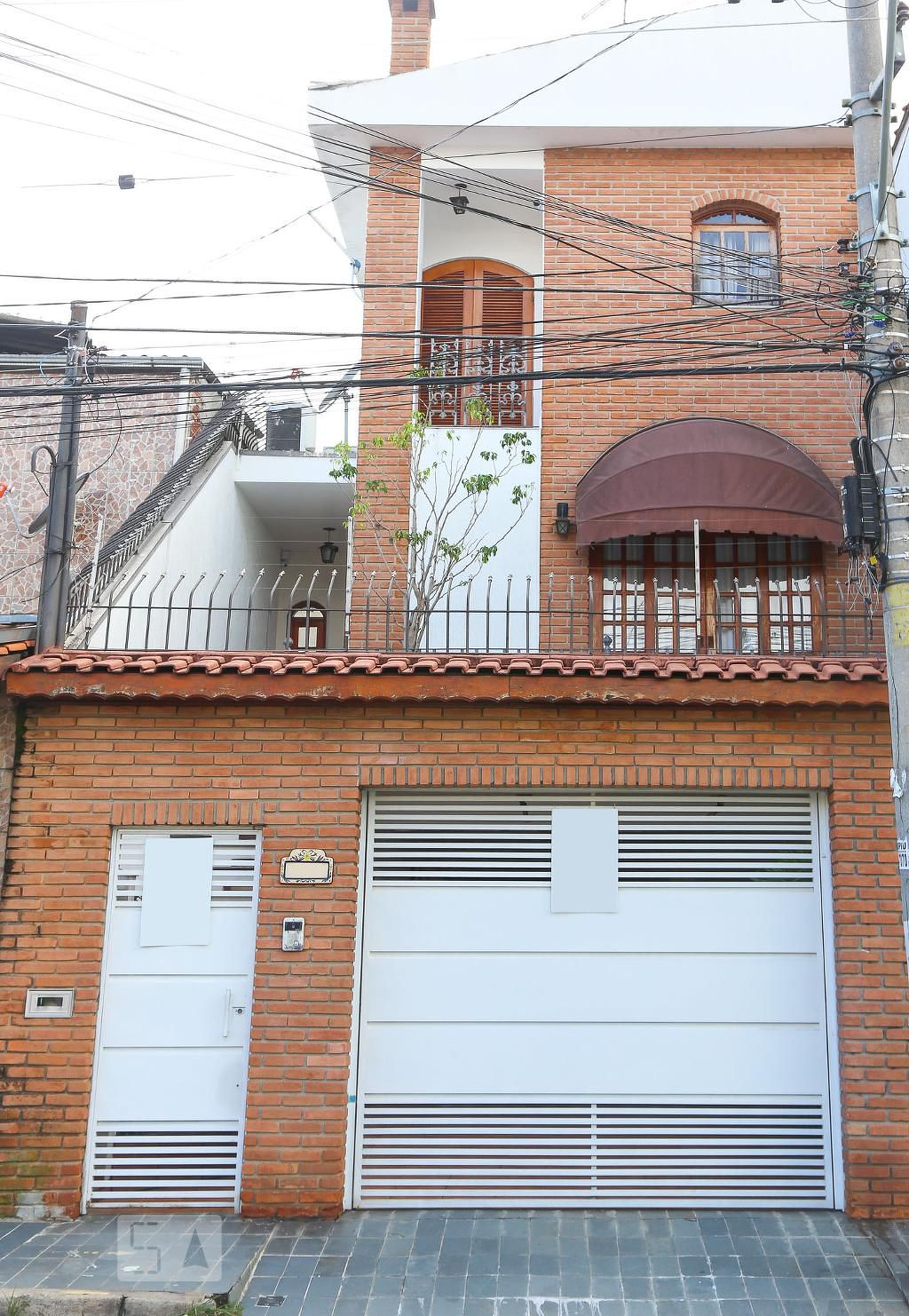 Fachada Condomínio em Rua Elvira de Bortole, 234