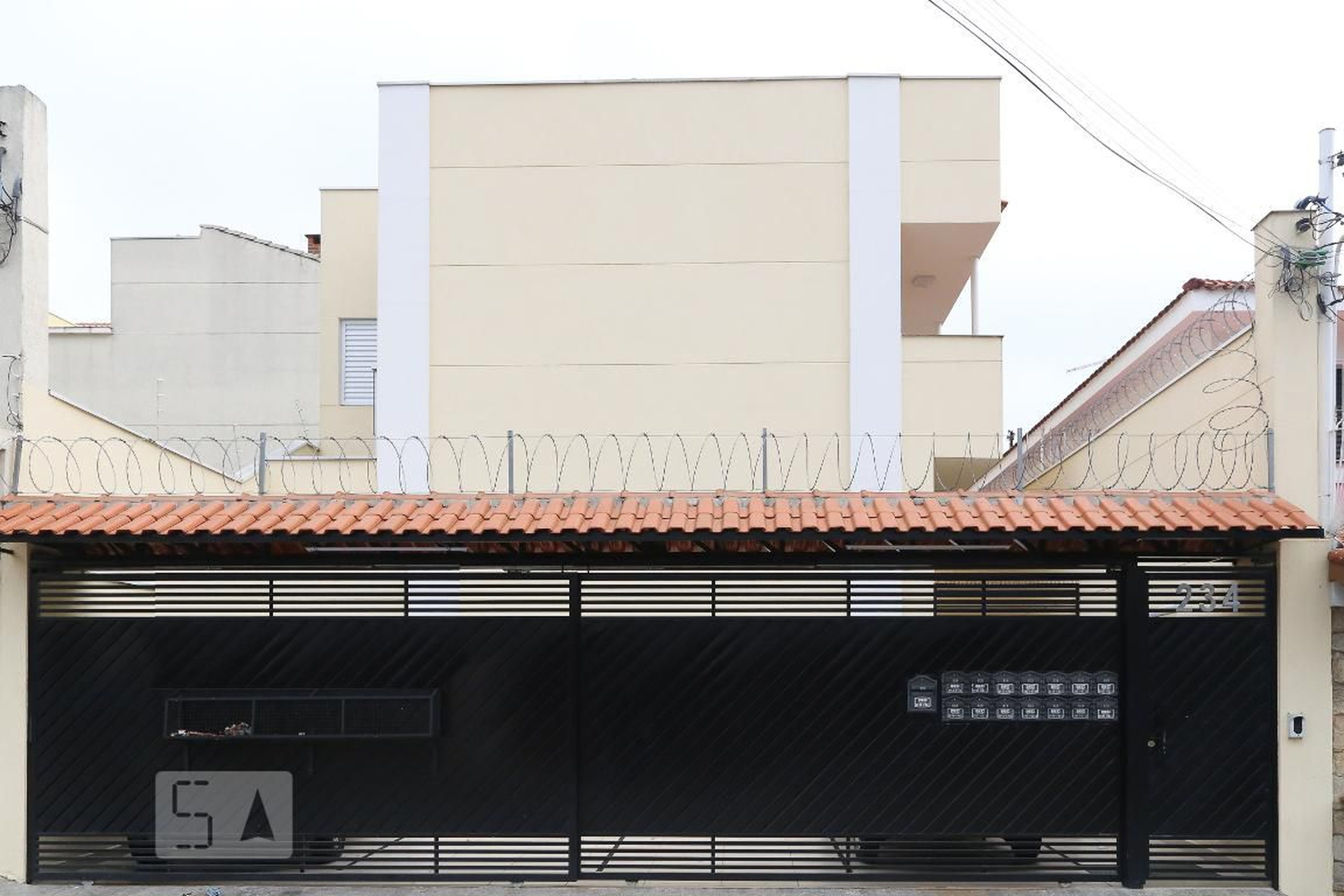 Fachada Condomínio em Rua Campêlo, 234