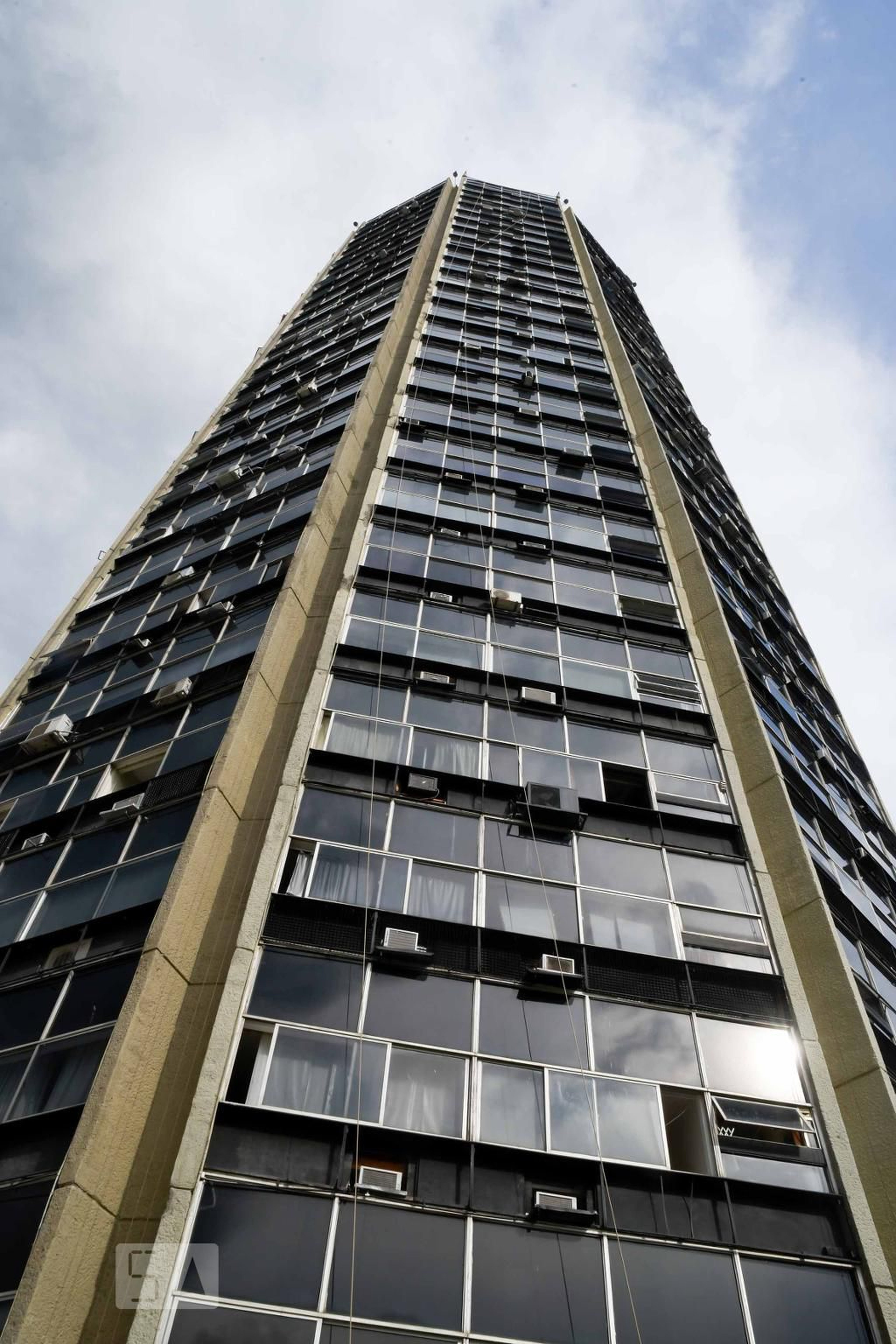 Fachada do Condomínio Condomínio Rio Flat