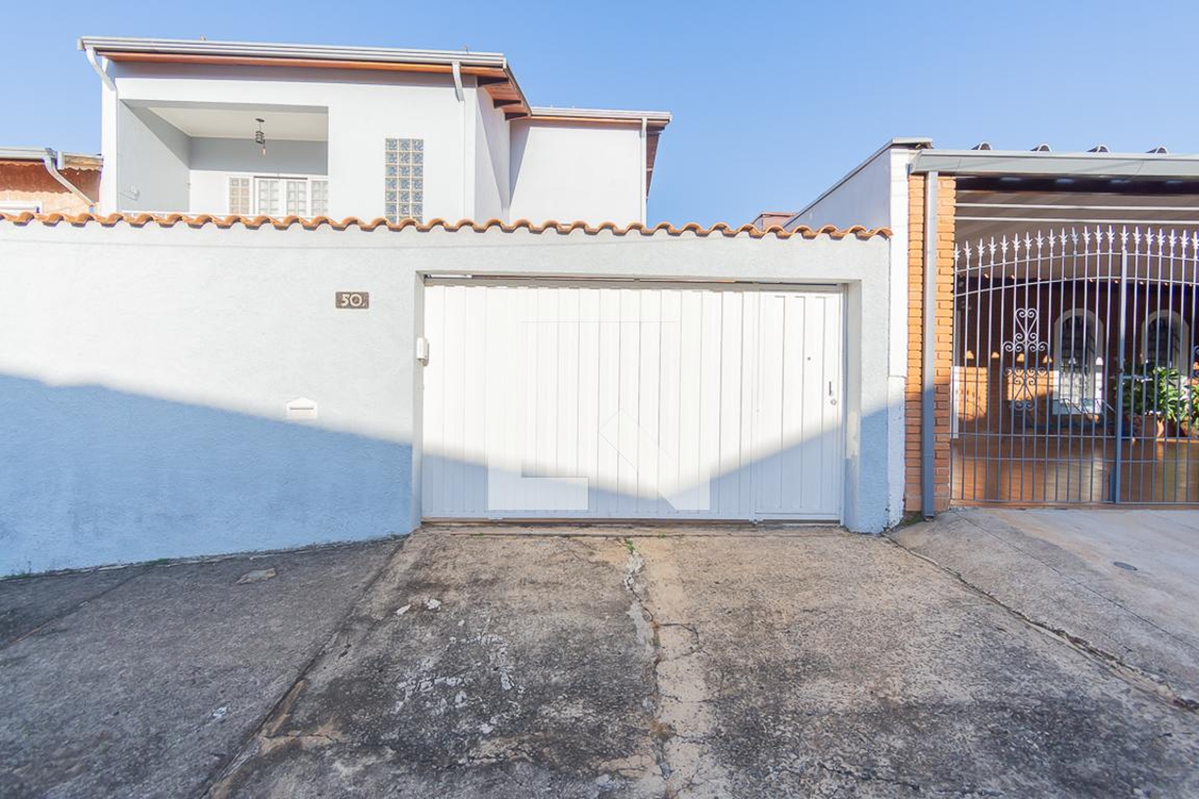 Fachada Condomínio edícula