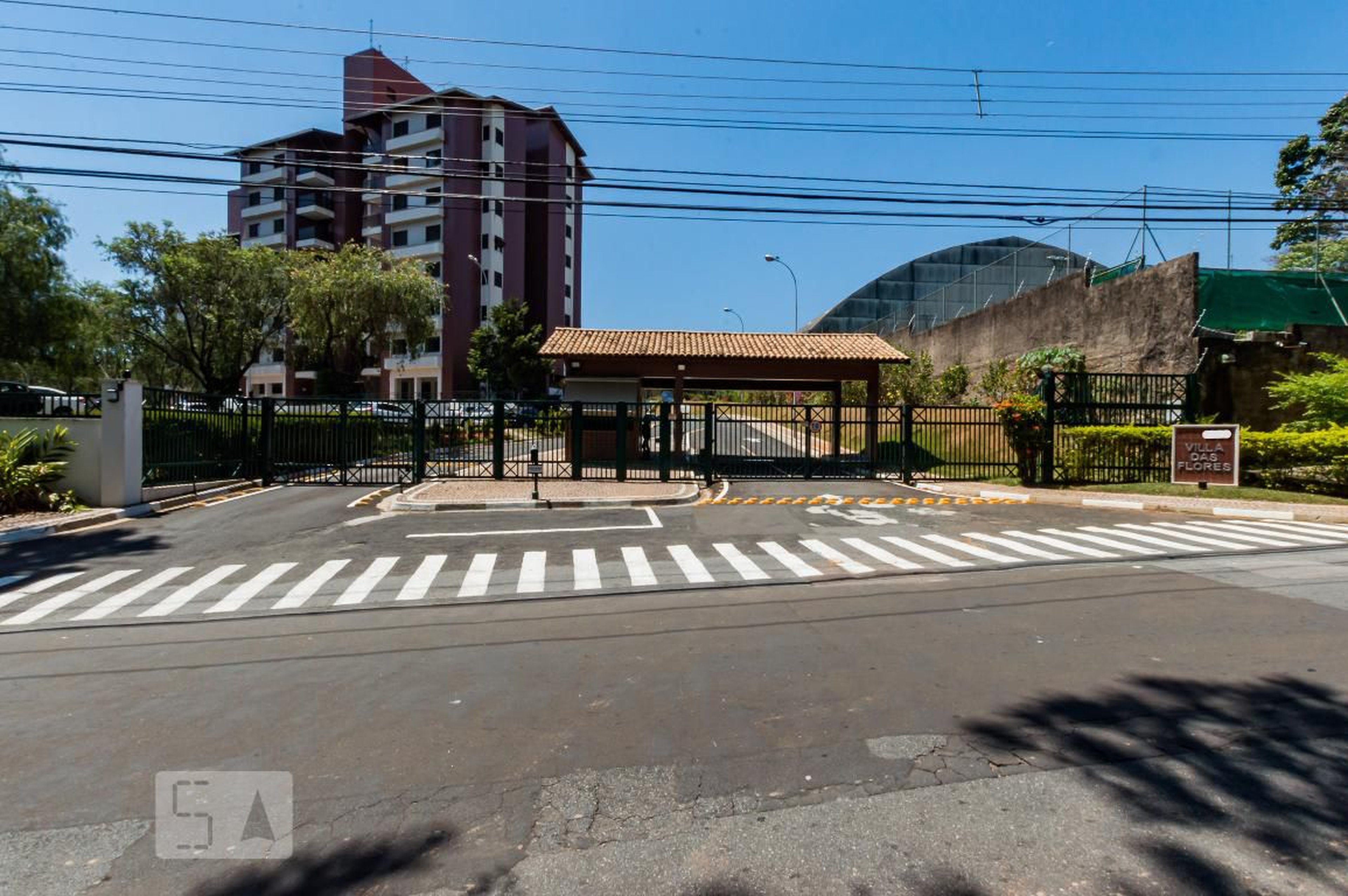 Fachada do Condomínio Condomínio Villa das Flores