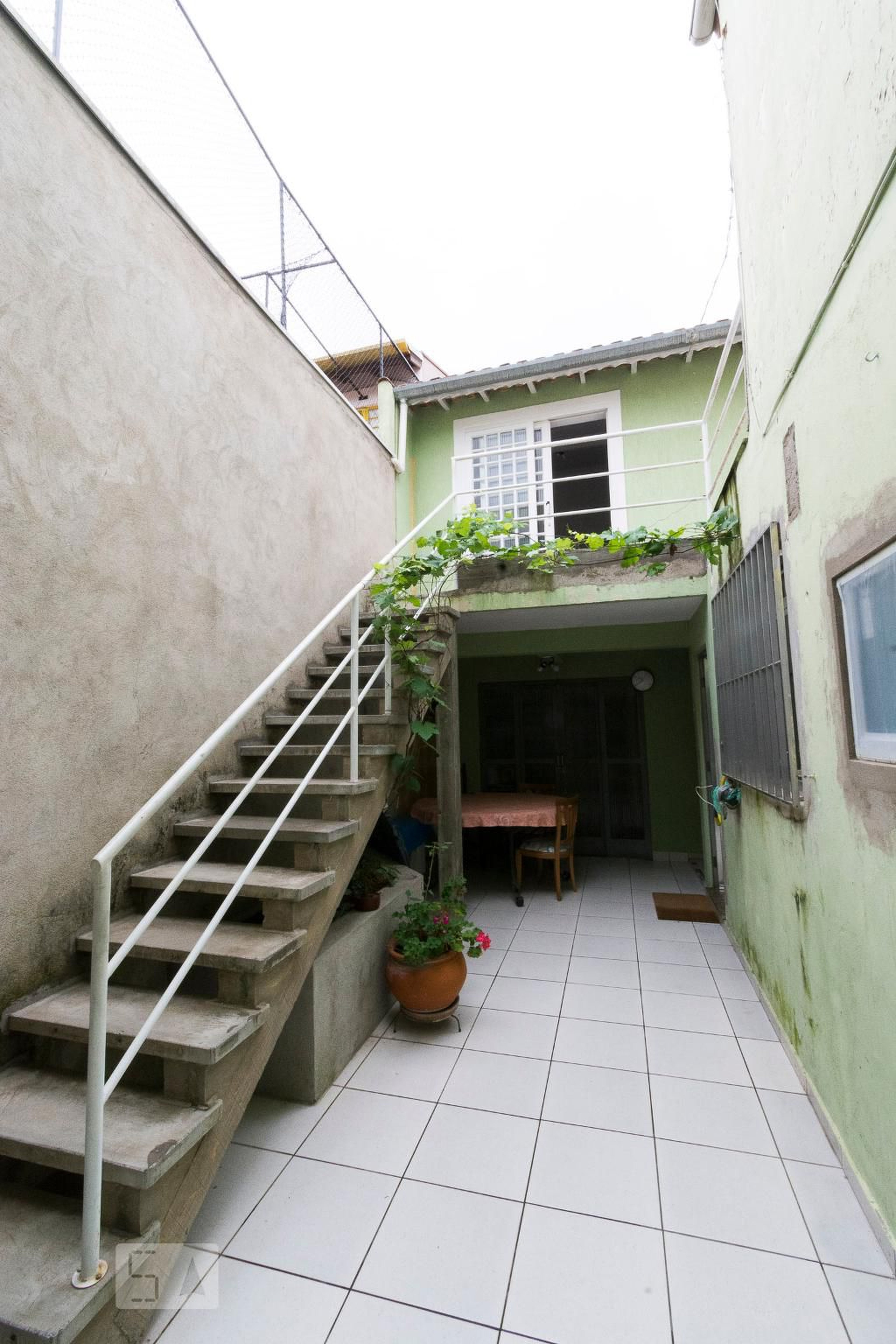 Fachada Condomínio em Rua Augusto Perroni, 386