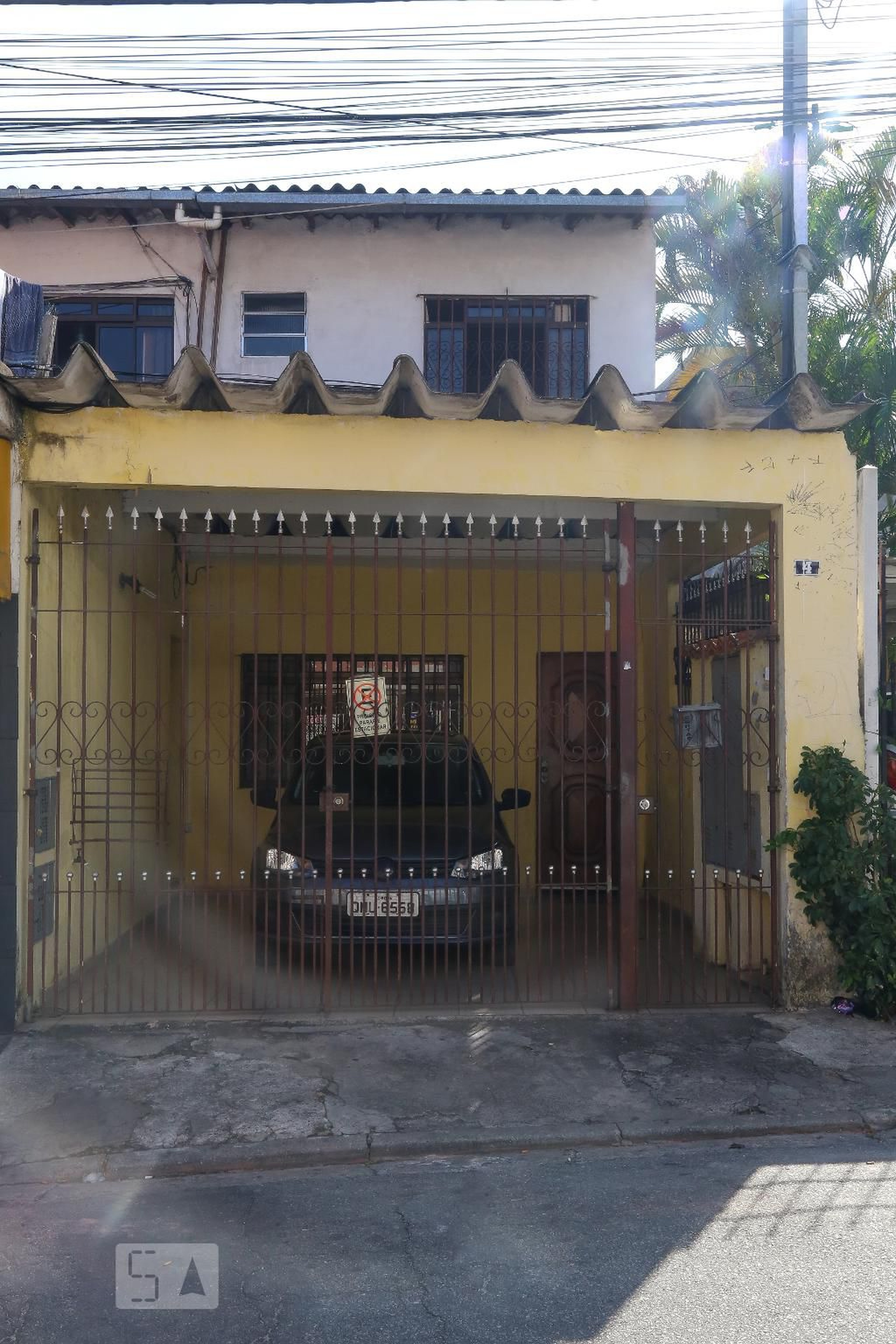 Fachada Condomínio em Rua Zuzarte Lopes, 4