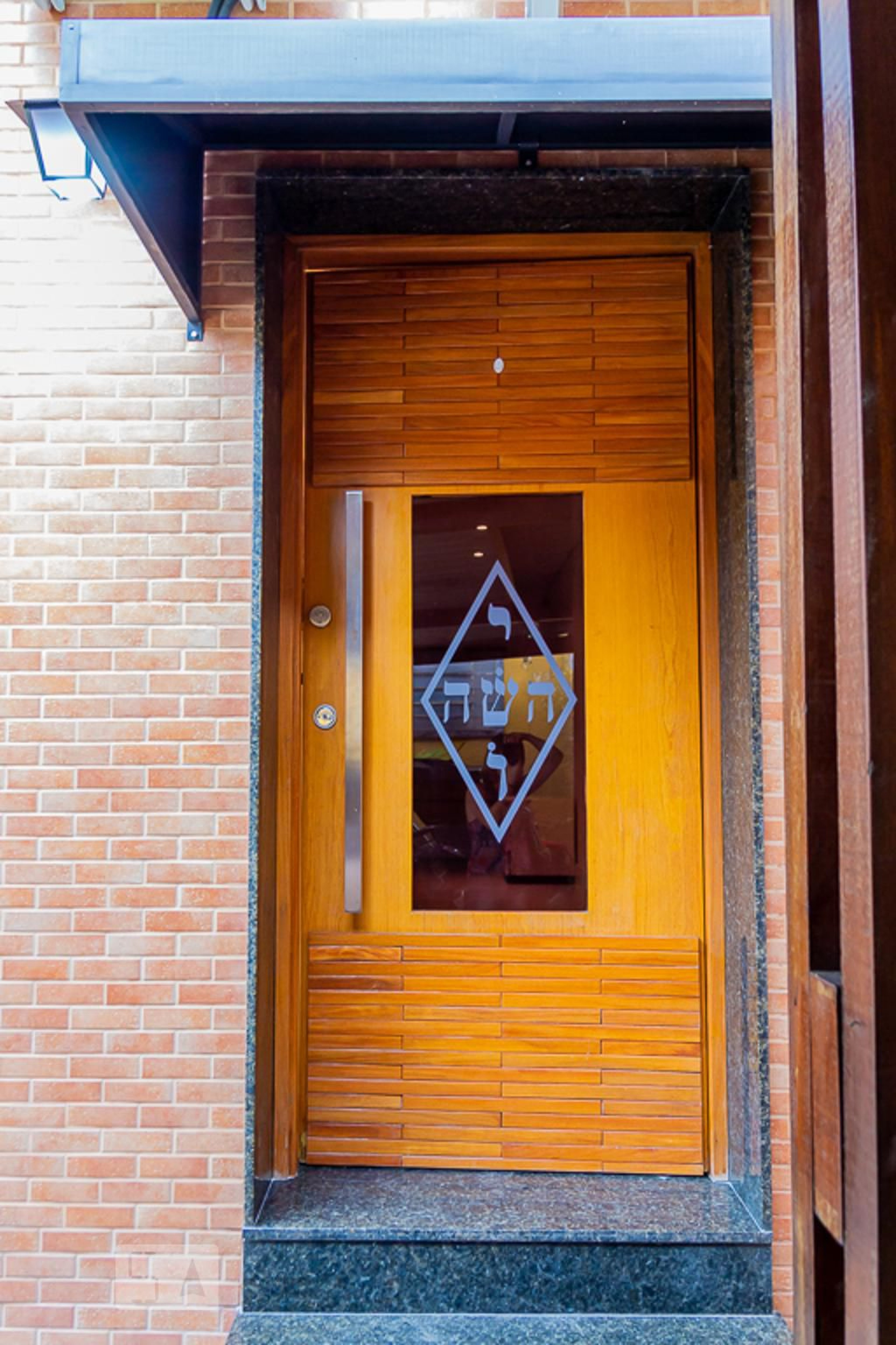 Fachada Condomínio em Rua Vigário Albernaz, 78