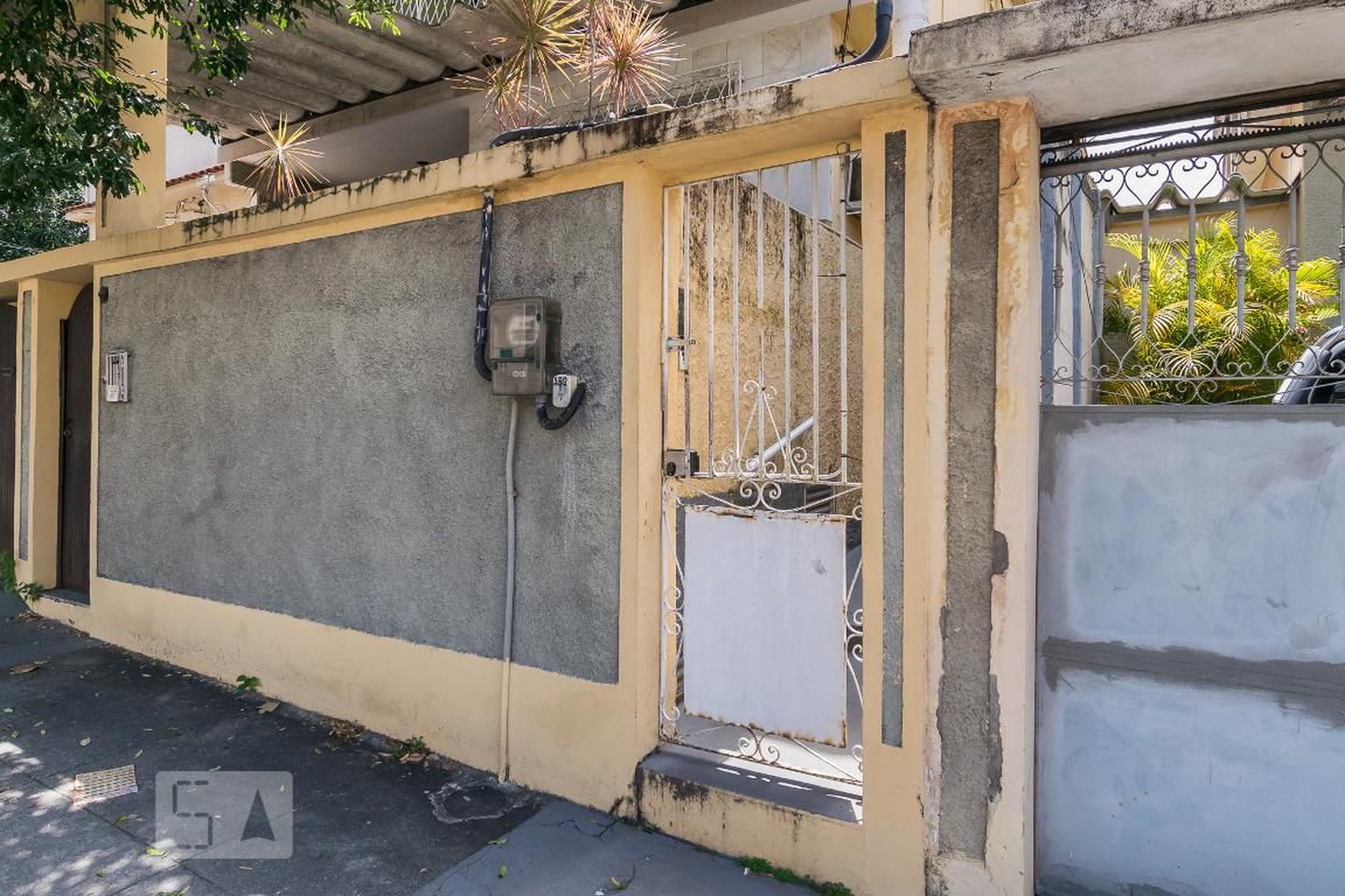 Fachada Condomínio em Rua Tiboim, 552