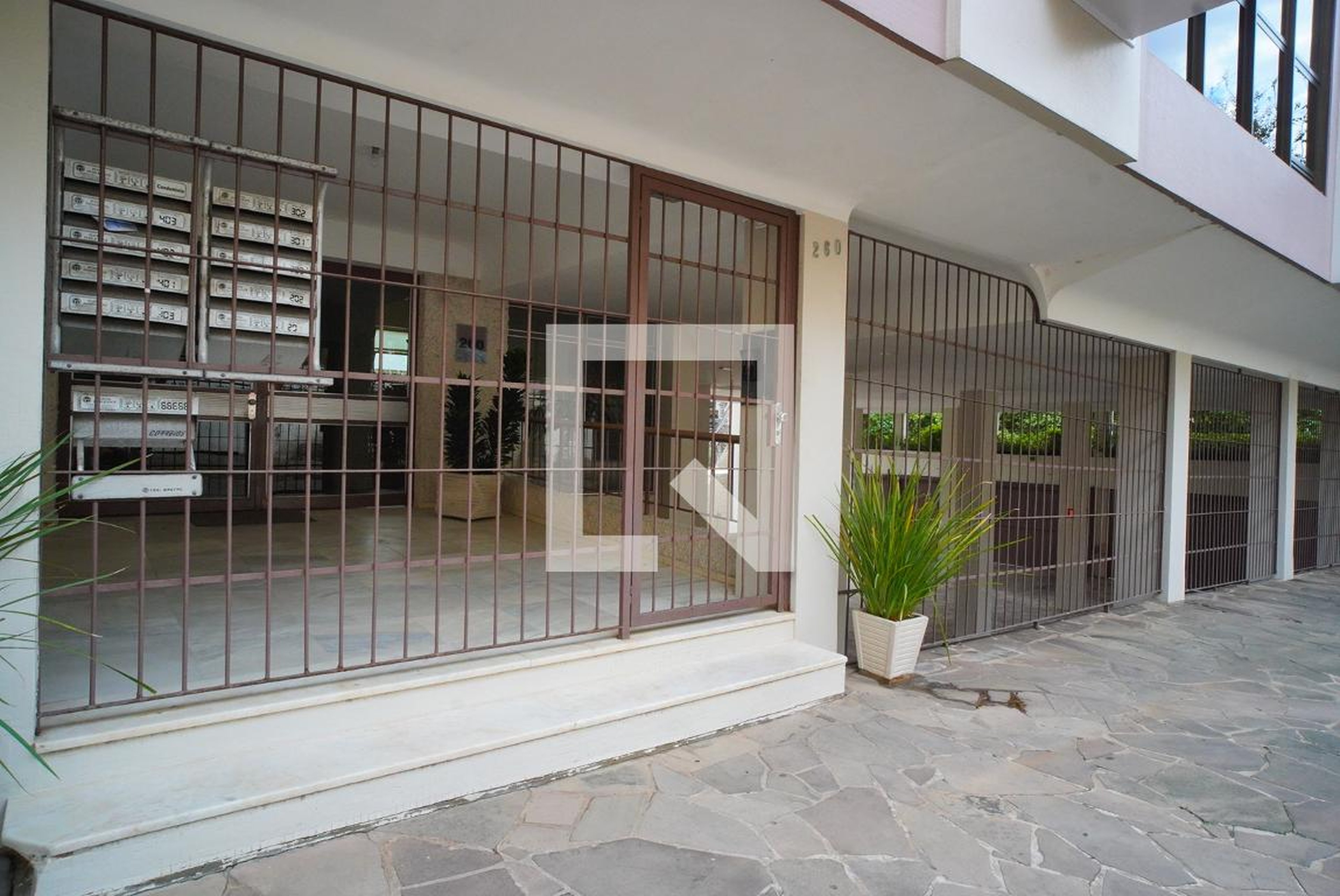 Fachada Condomínio em Rua Coronel Manoel Py, 260