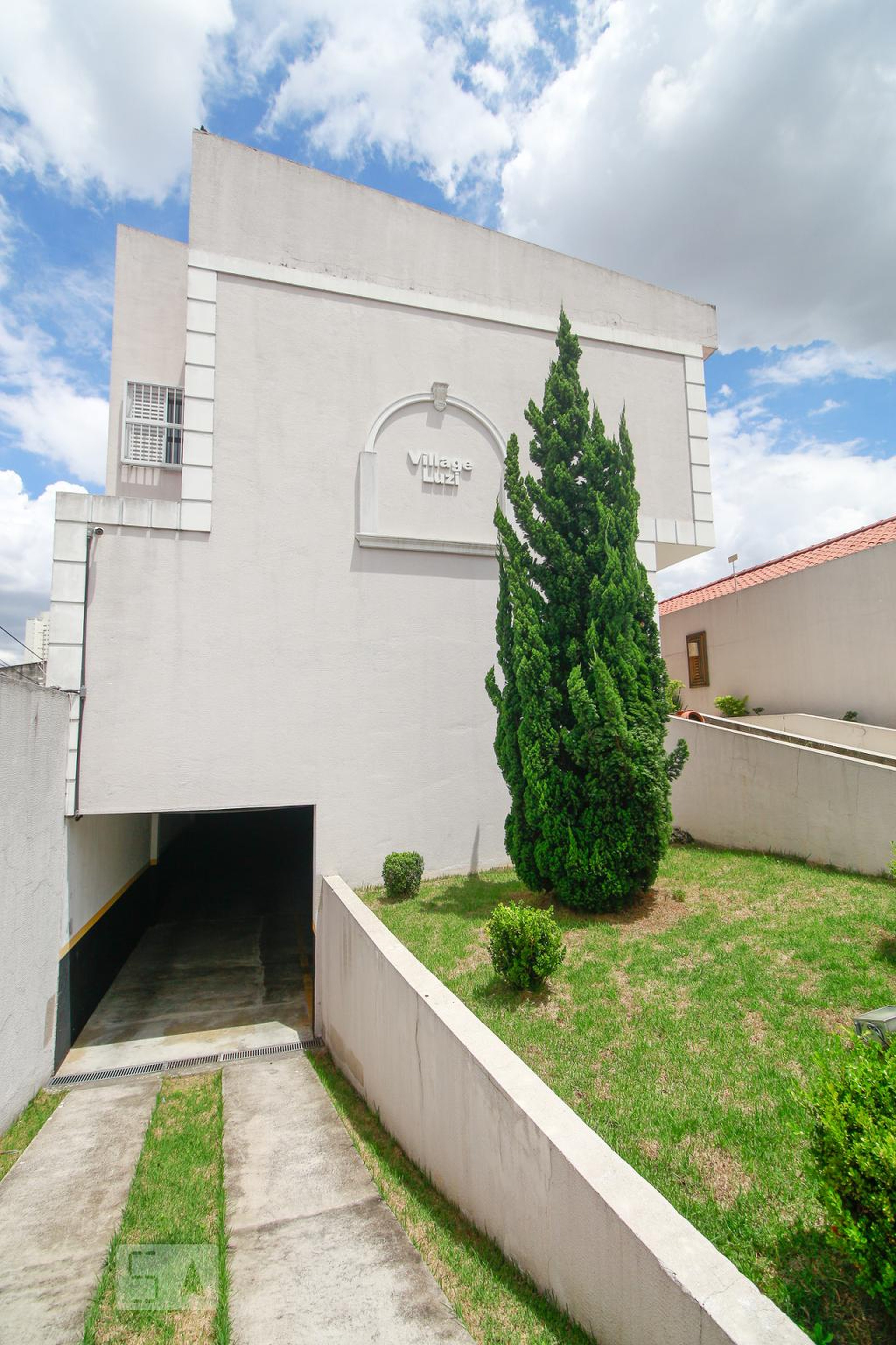Fachada Condomínio Village Luzi