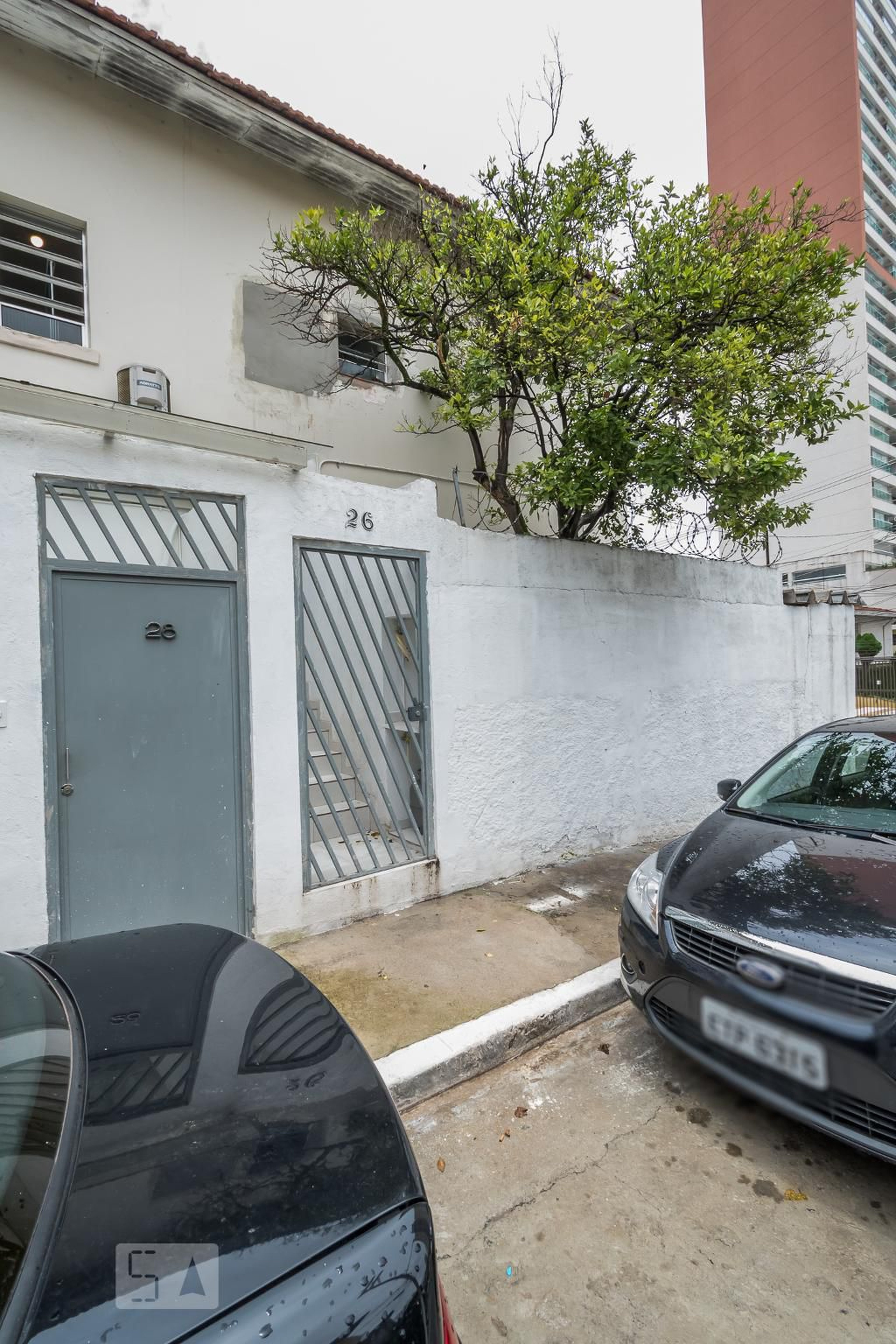 Fachada Condomínio em Rua Benjamin Costa, 26