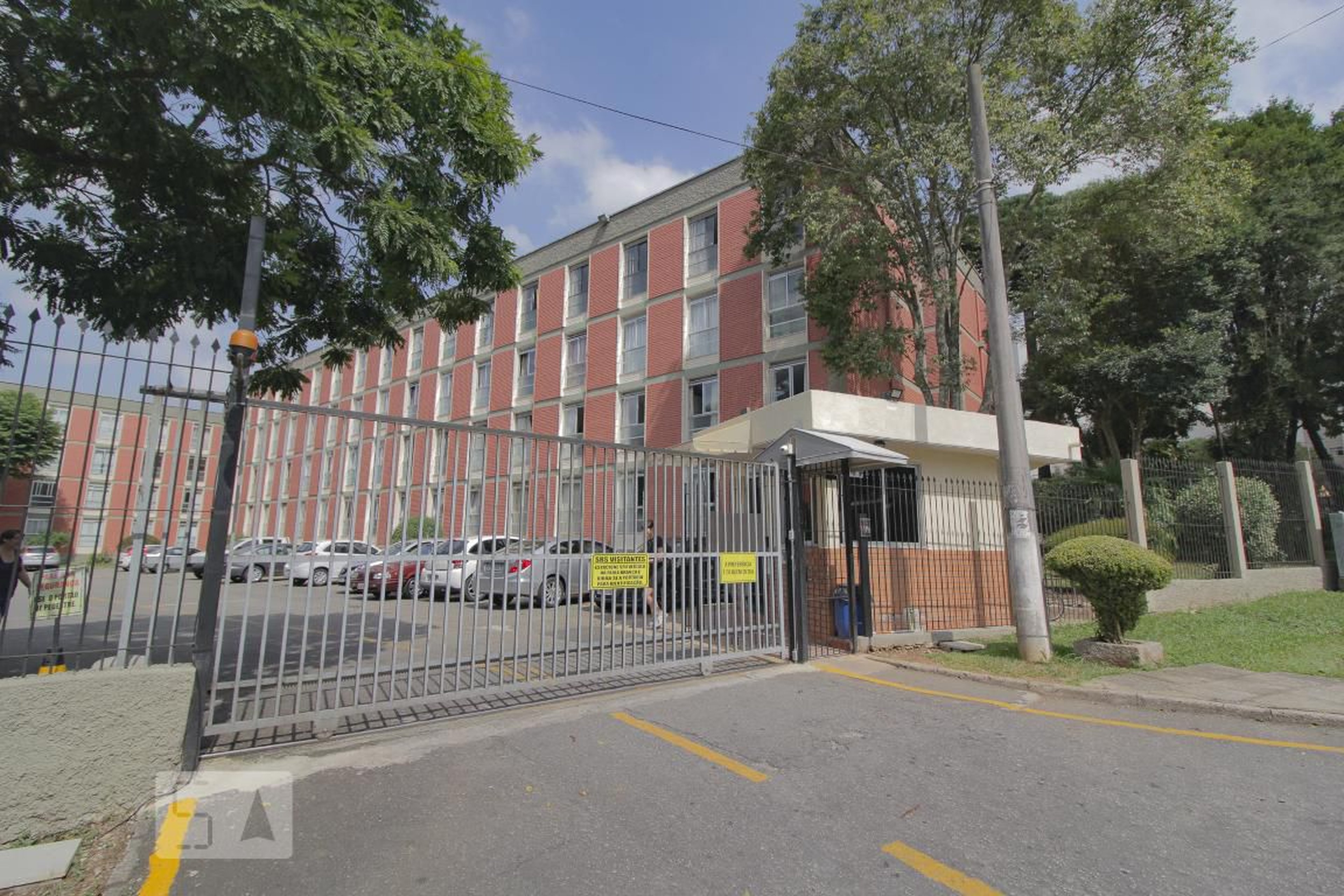 Fachada do Condomínio Condomínio Conjunto Residêncial Novo Mundo