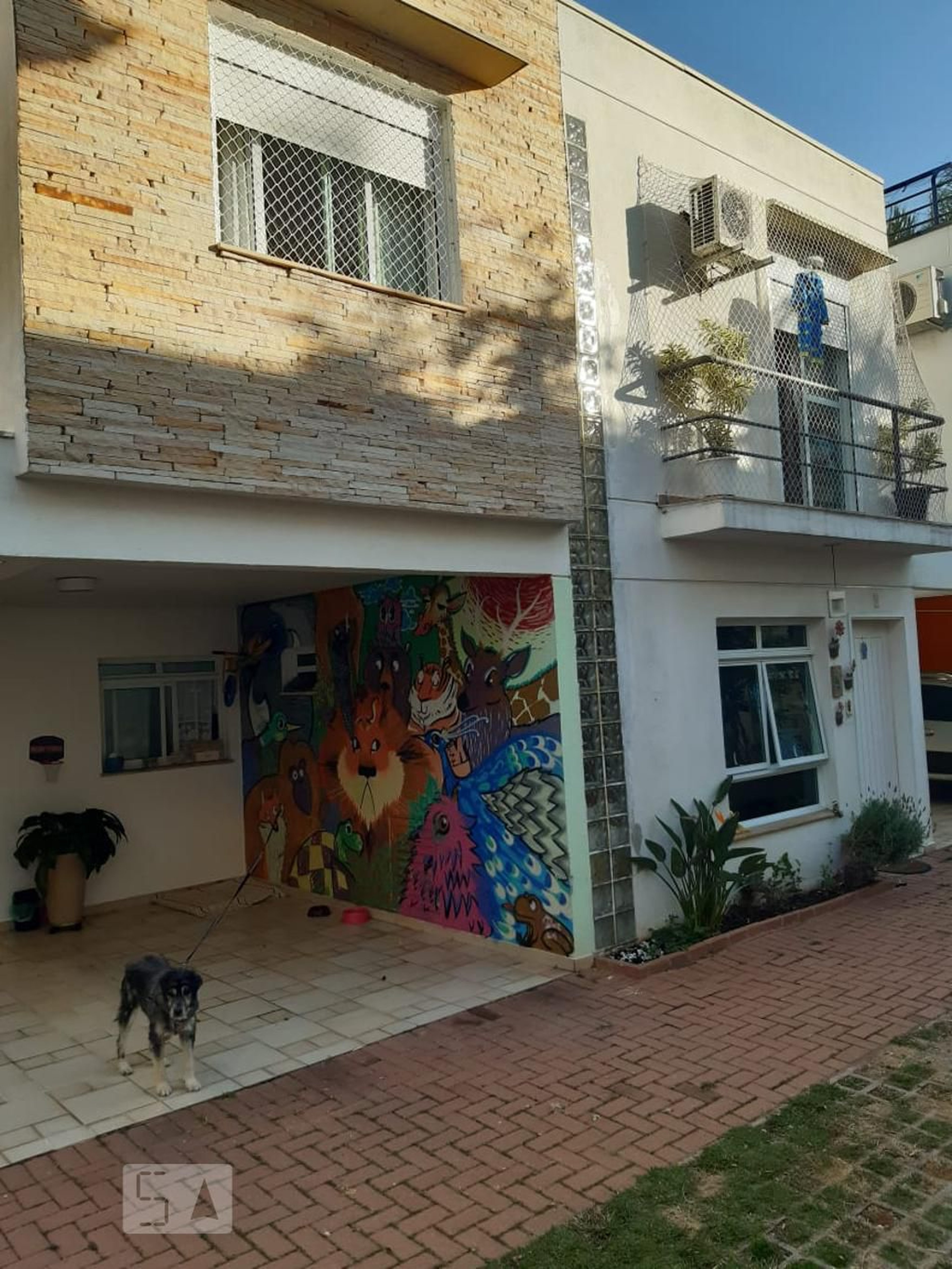 Fachada Condomínio em Rua Mandiçununga, 313