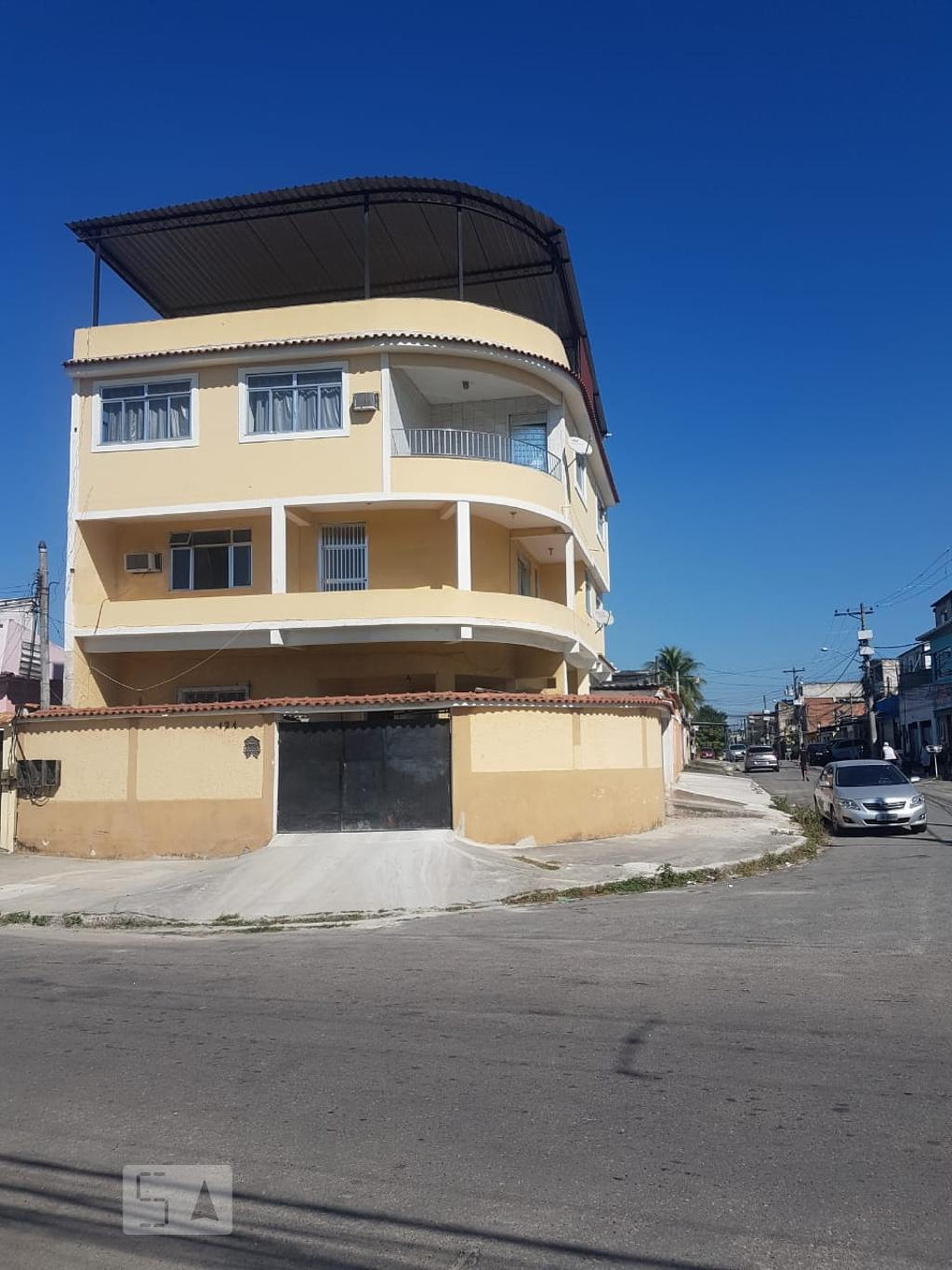 Fachada Condomínio em Rua Aralia, 124