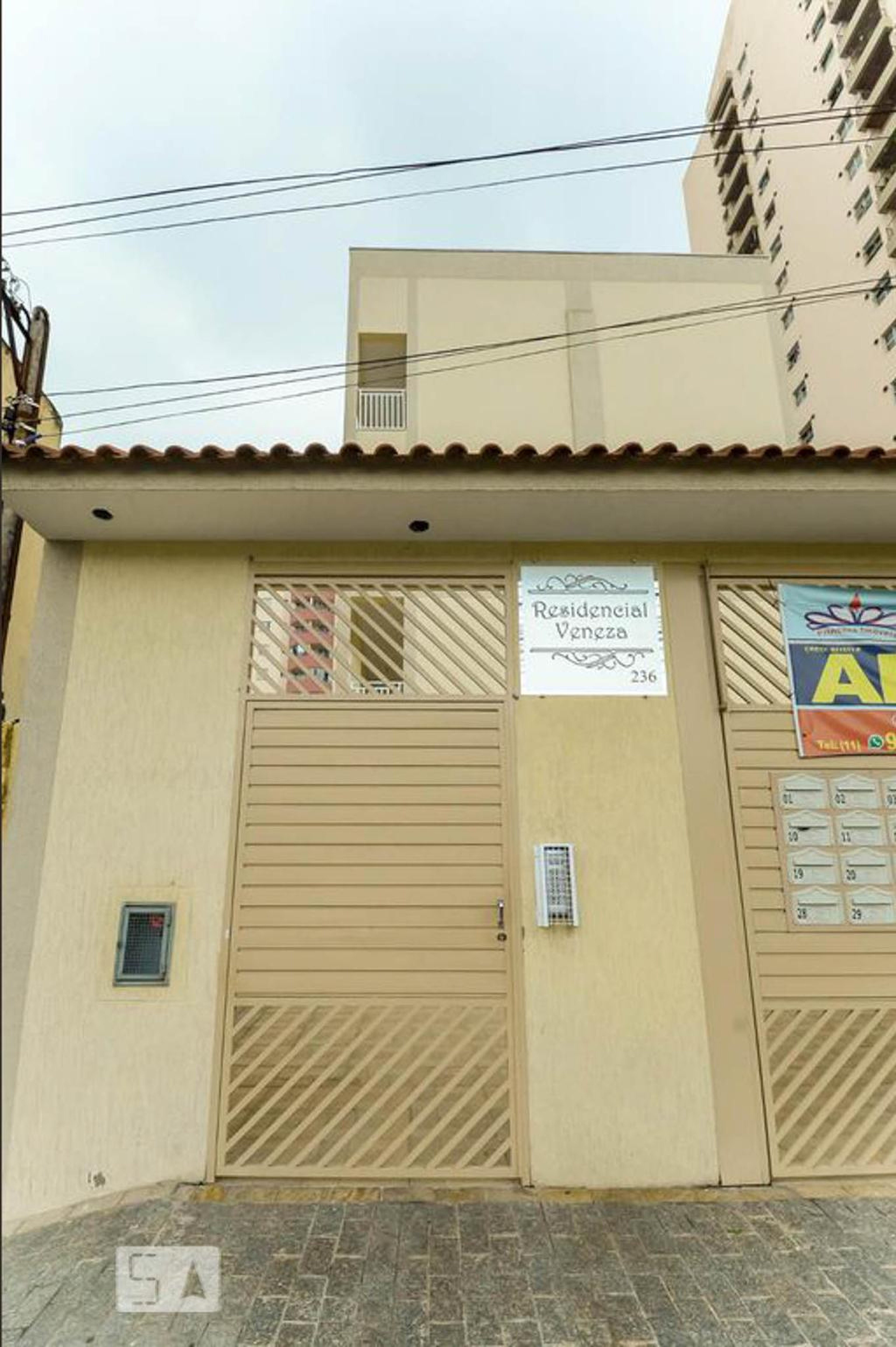 Fachada do Condomínio Condomínio Veneza