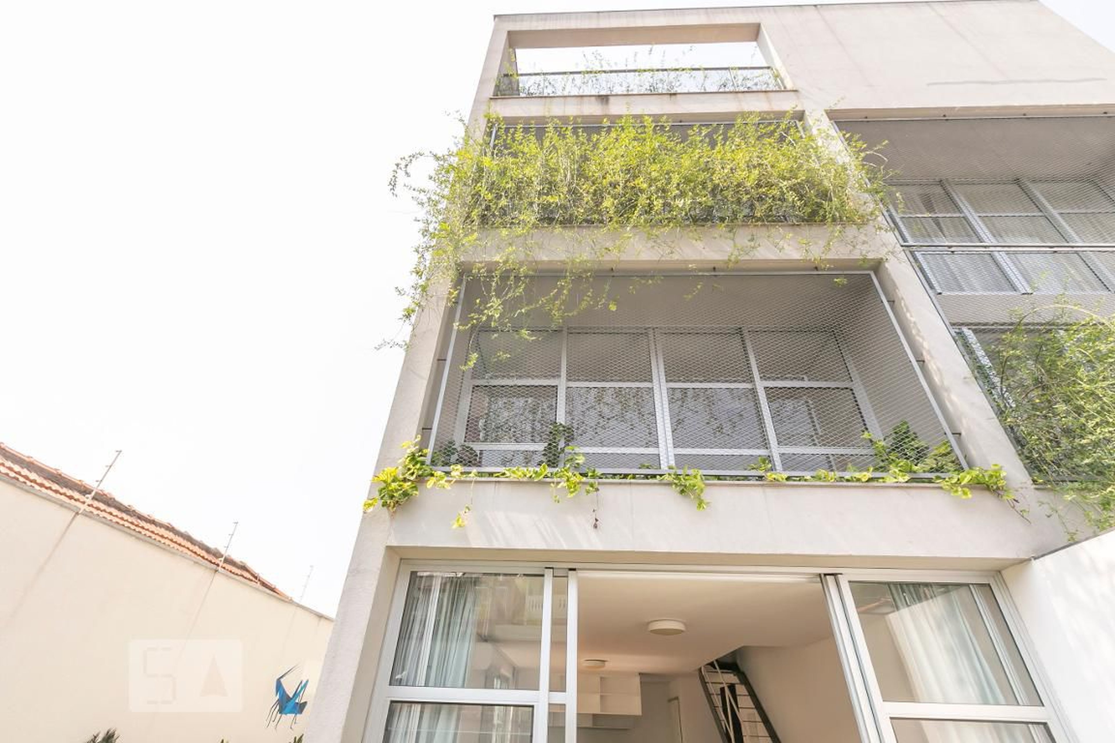 Fachada Condomínio em Rua Camburiú, 277