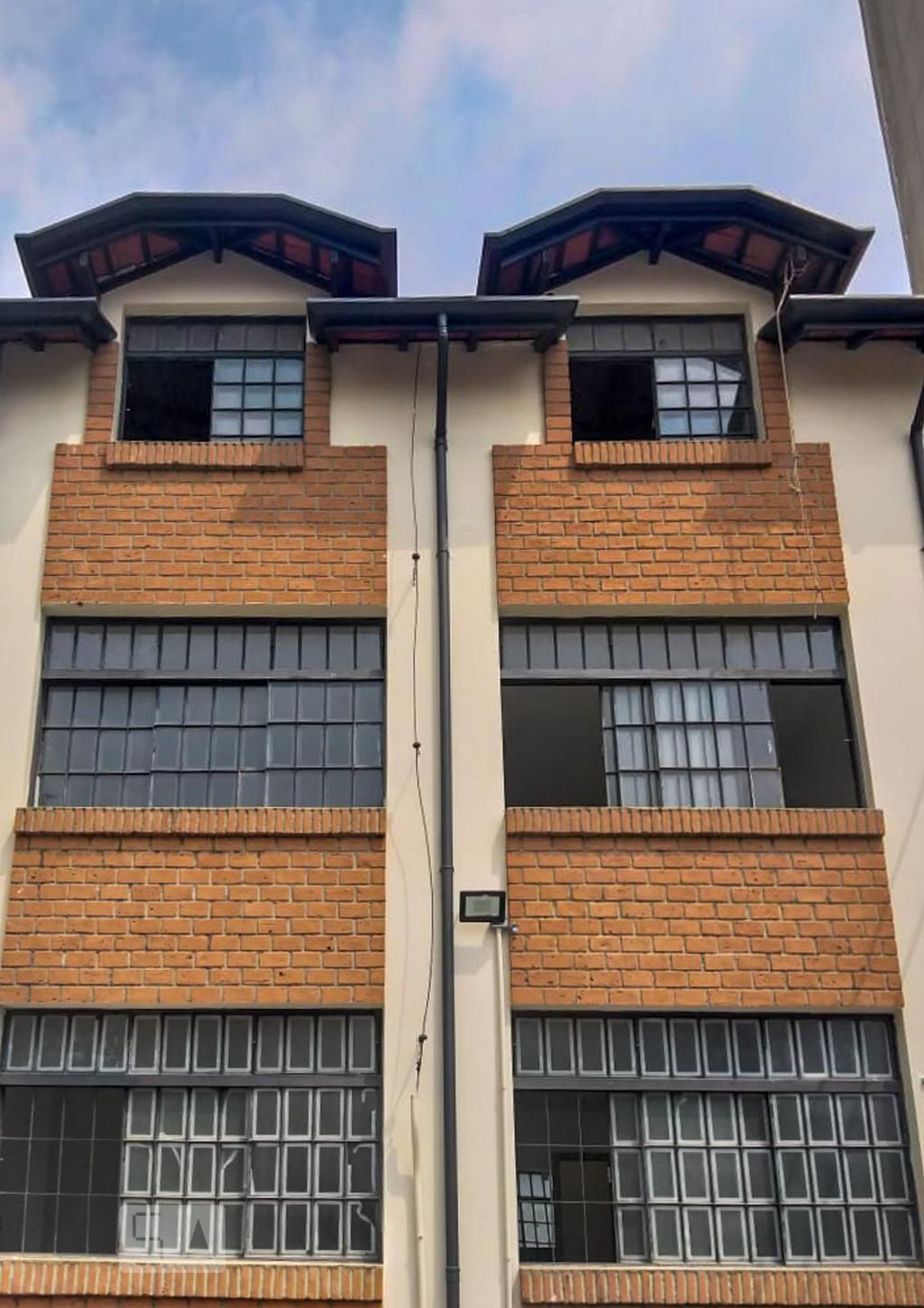 Fachada Condomínio em Rua Harmonia, 1039