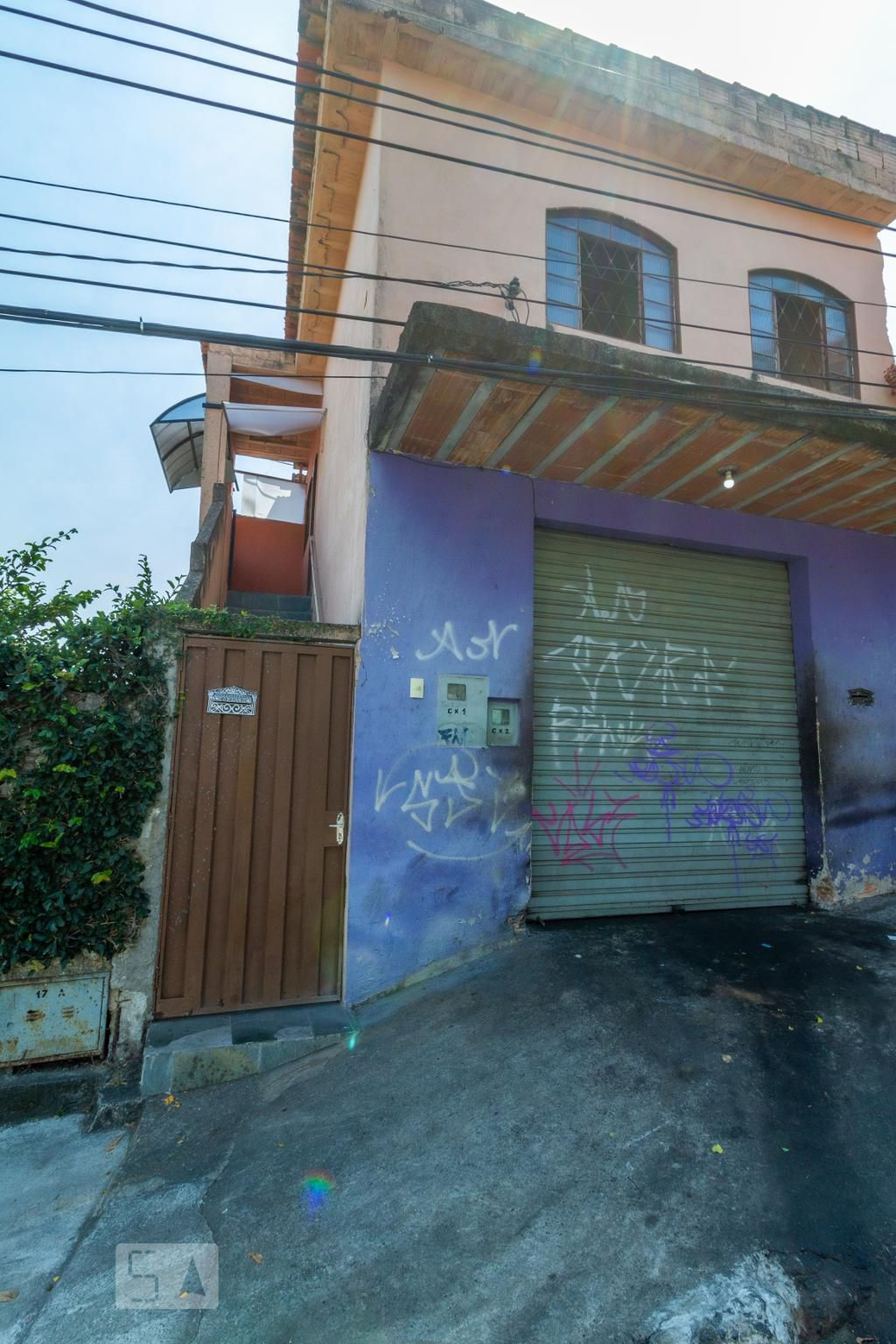 Fachada Condomínio em Rua Rosa Cruz, 17