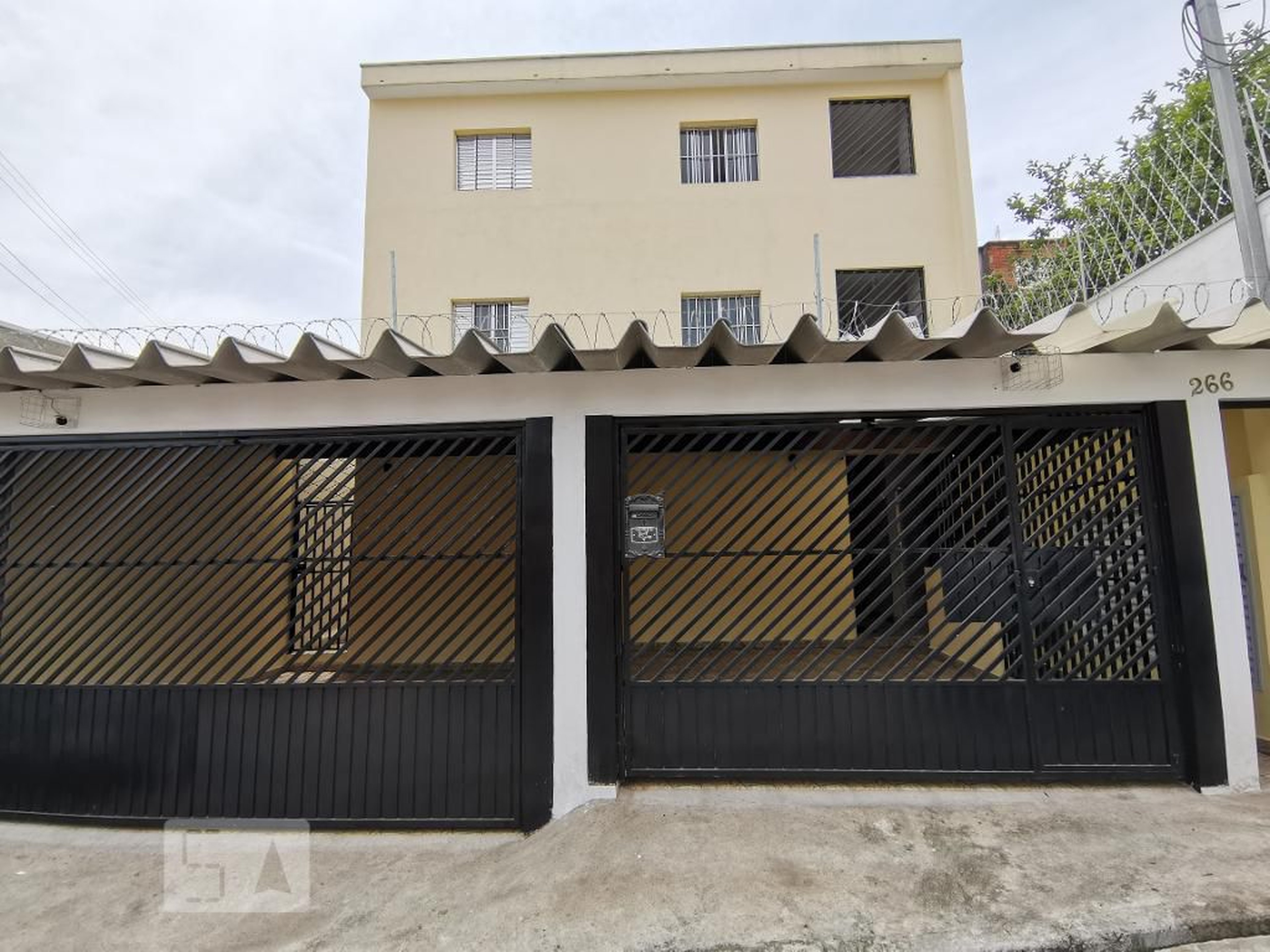 Fachada Condomínio Kitnet 15