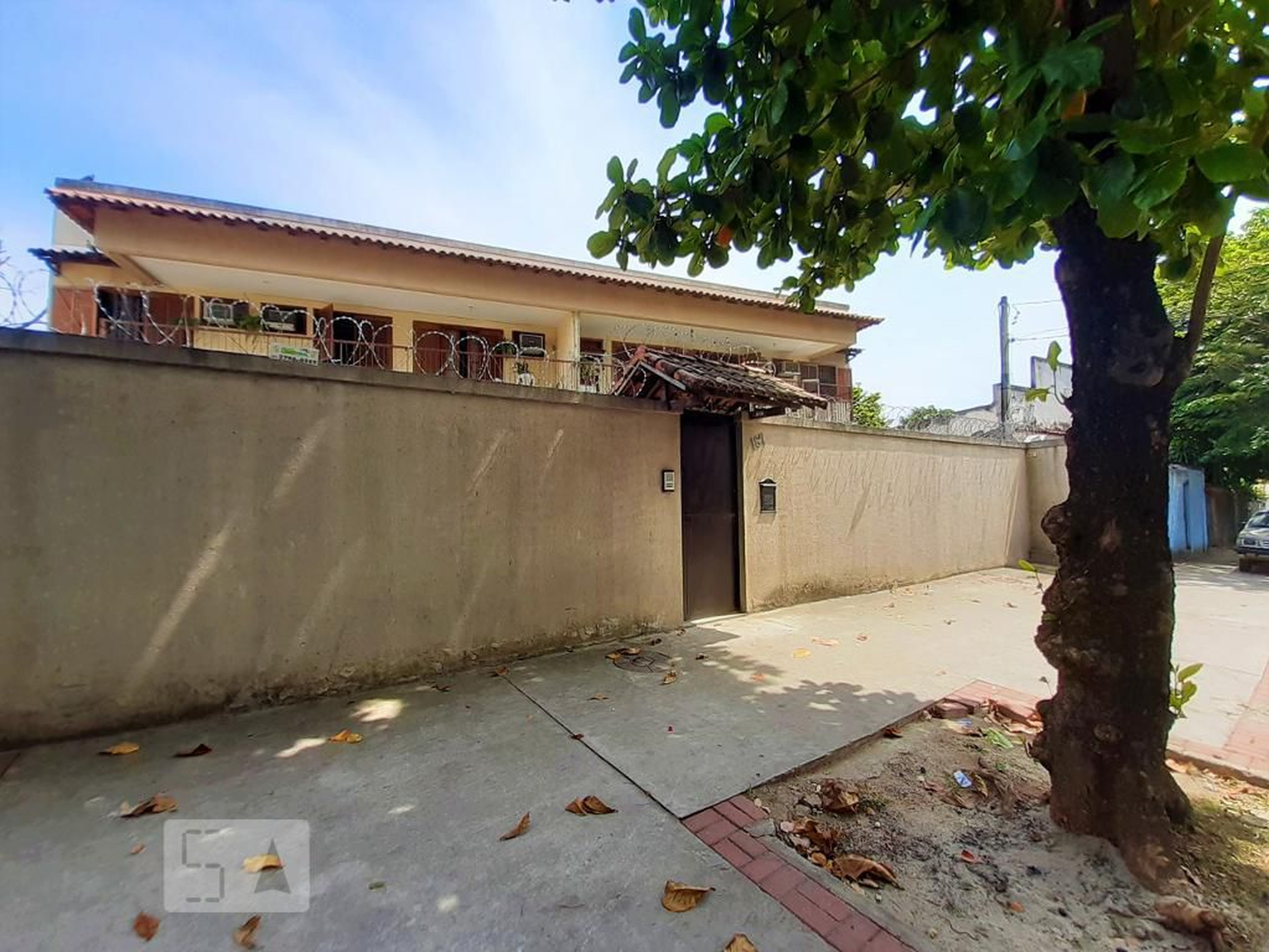 Fachada Condomínio em Rua Honório, 187