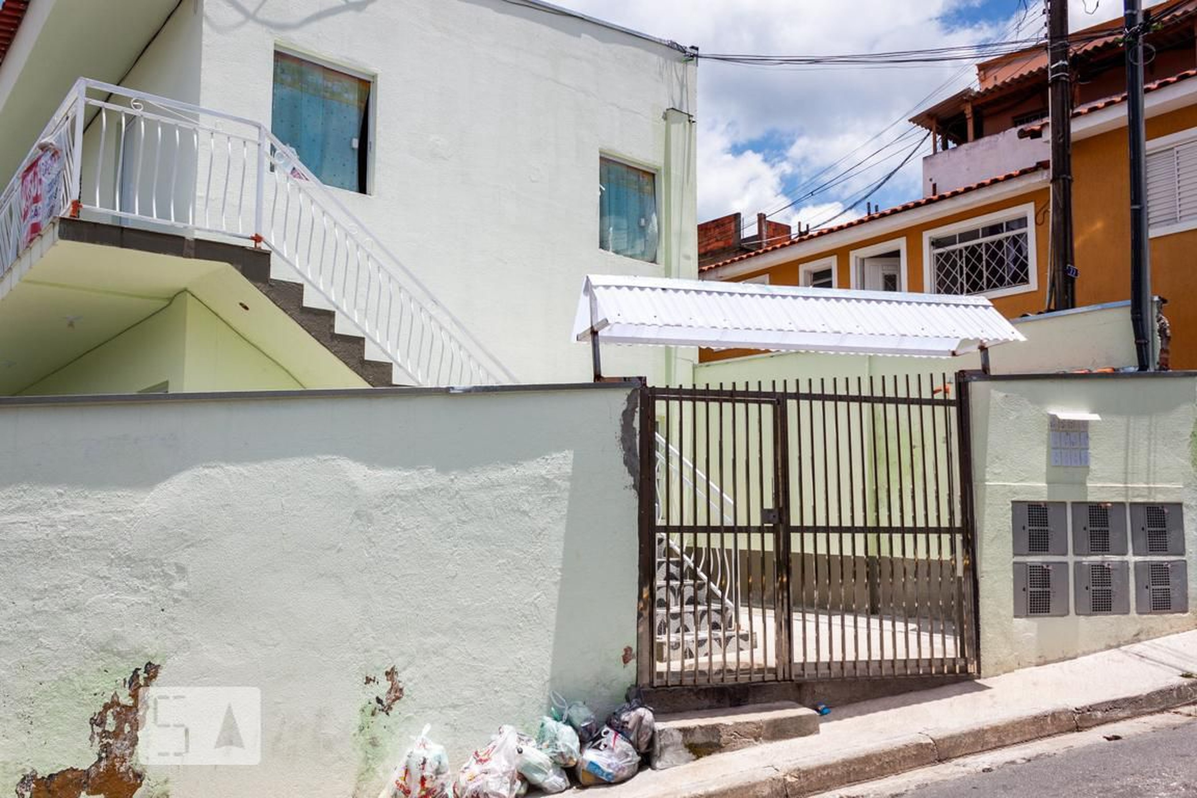 Fachada Condomínio em Rua Canabuoca, 69