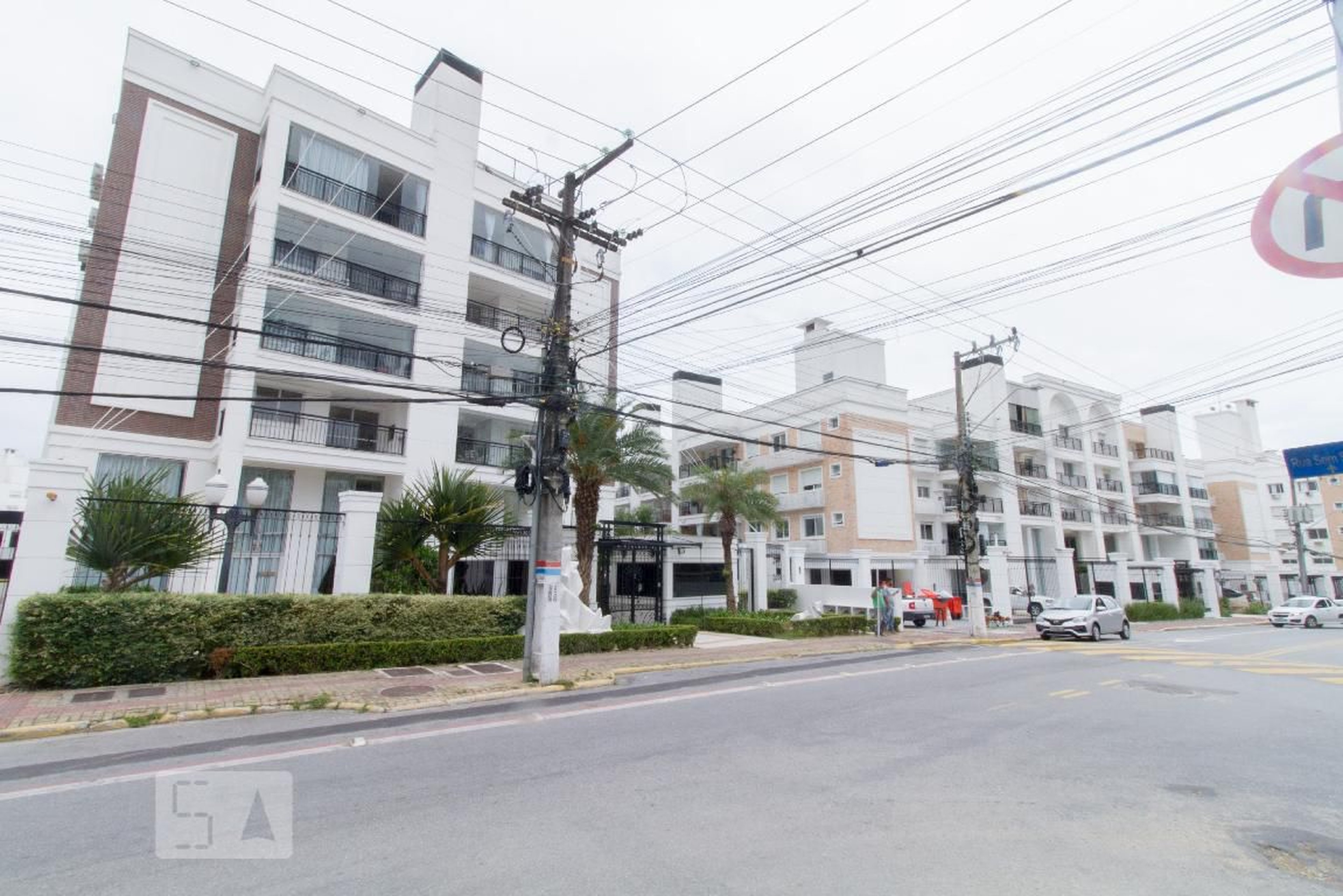 Fachada do Condomínio Condomínio Neoville