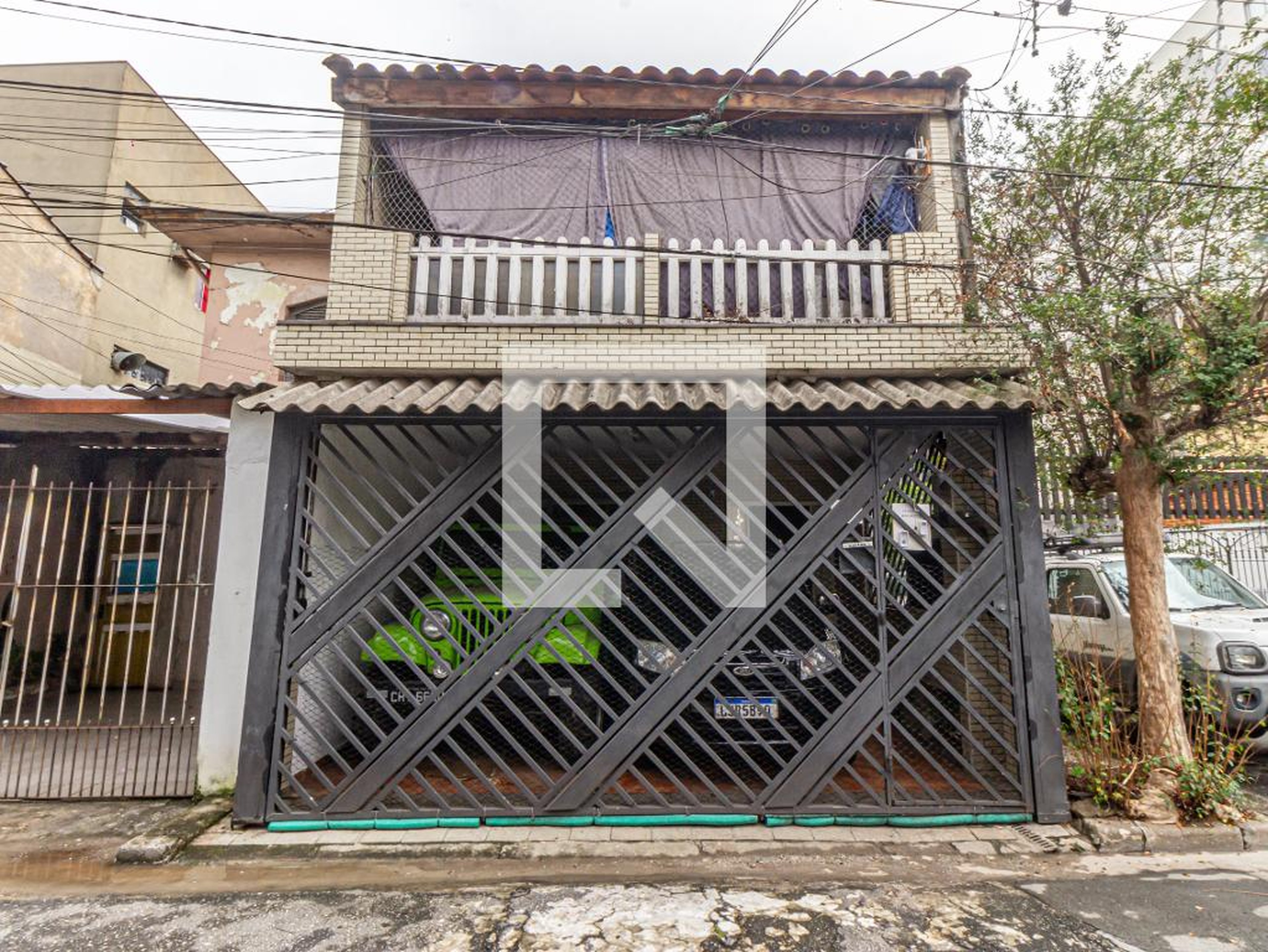 Fachada Condomínio em Rua Ulisses Cruz, 76