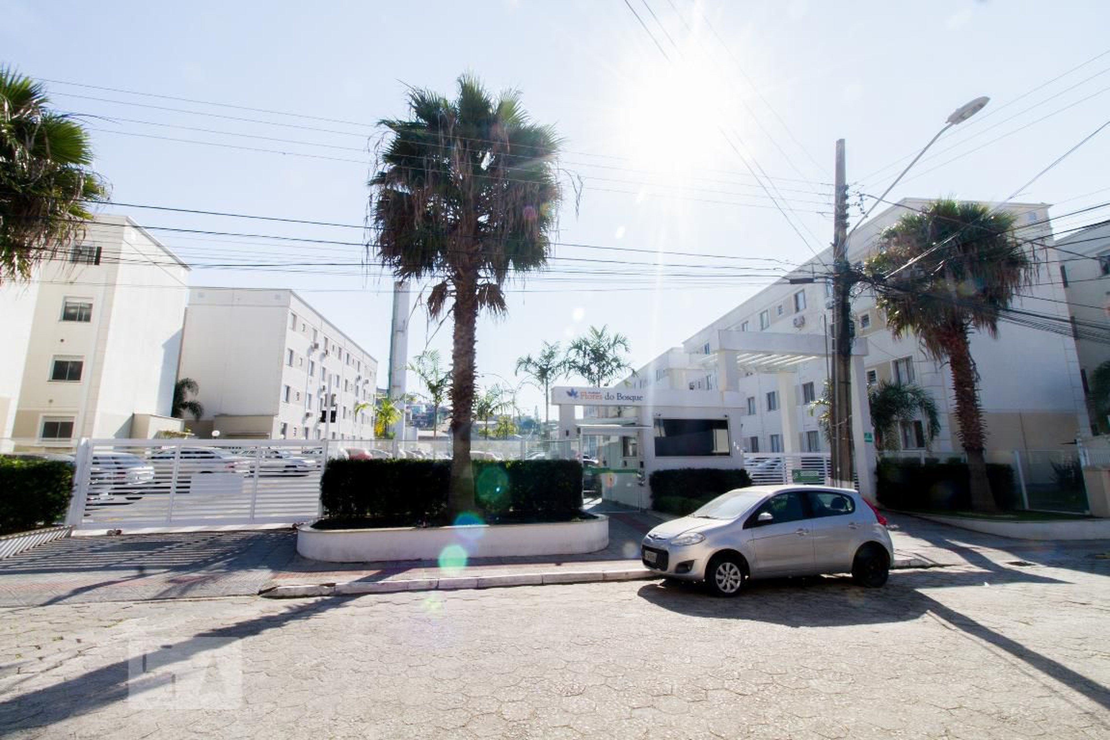 Fachada do Condomínio Condomínio Parque Flores do Bosque