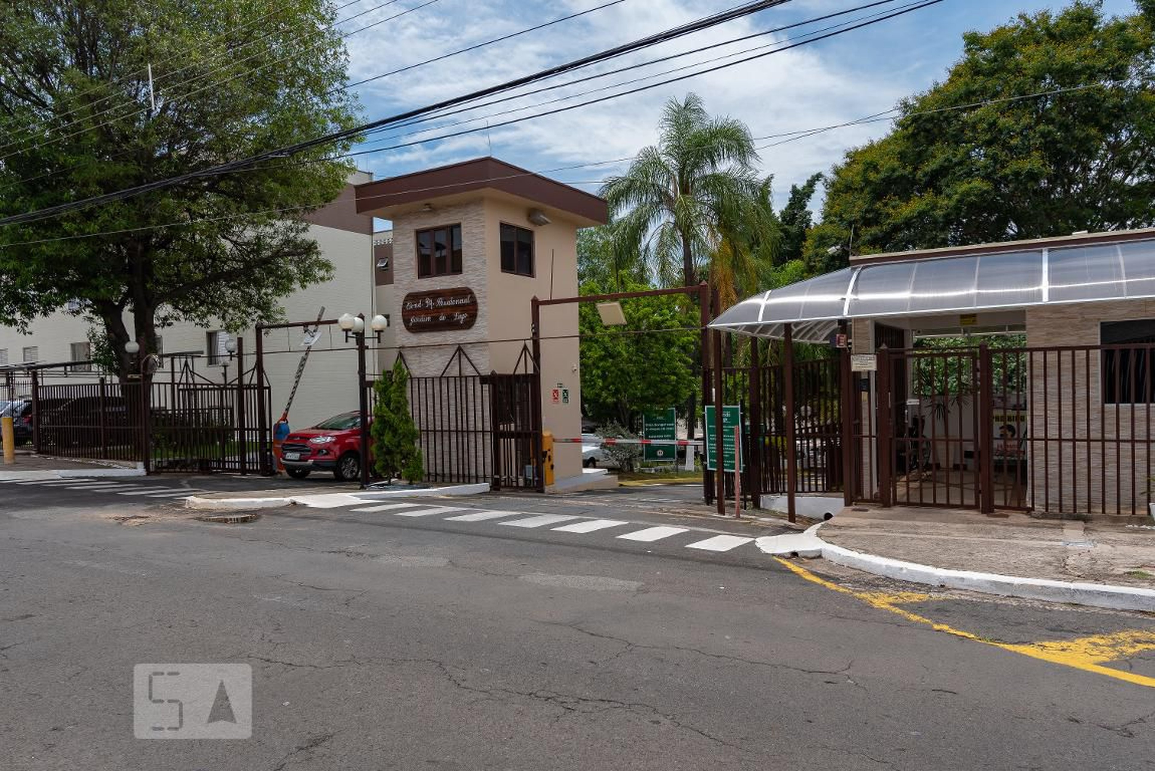 Fachada do Condomínio Condomínio Jardim do Lago