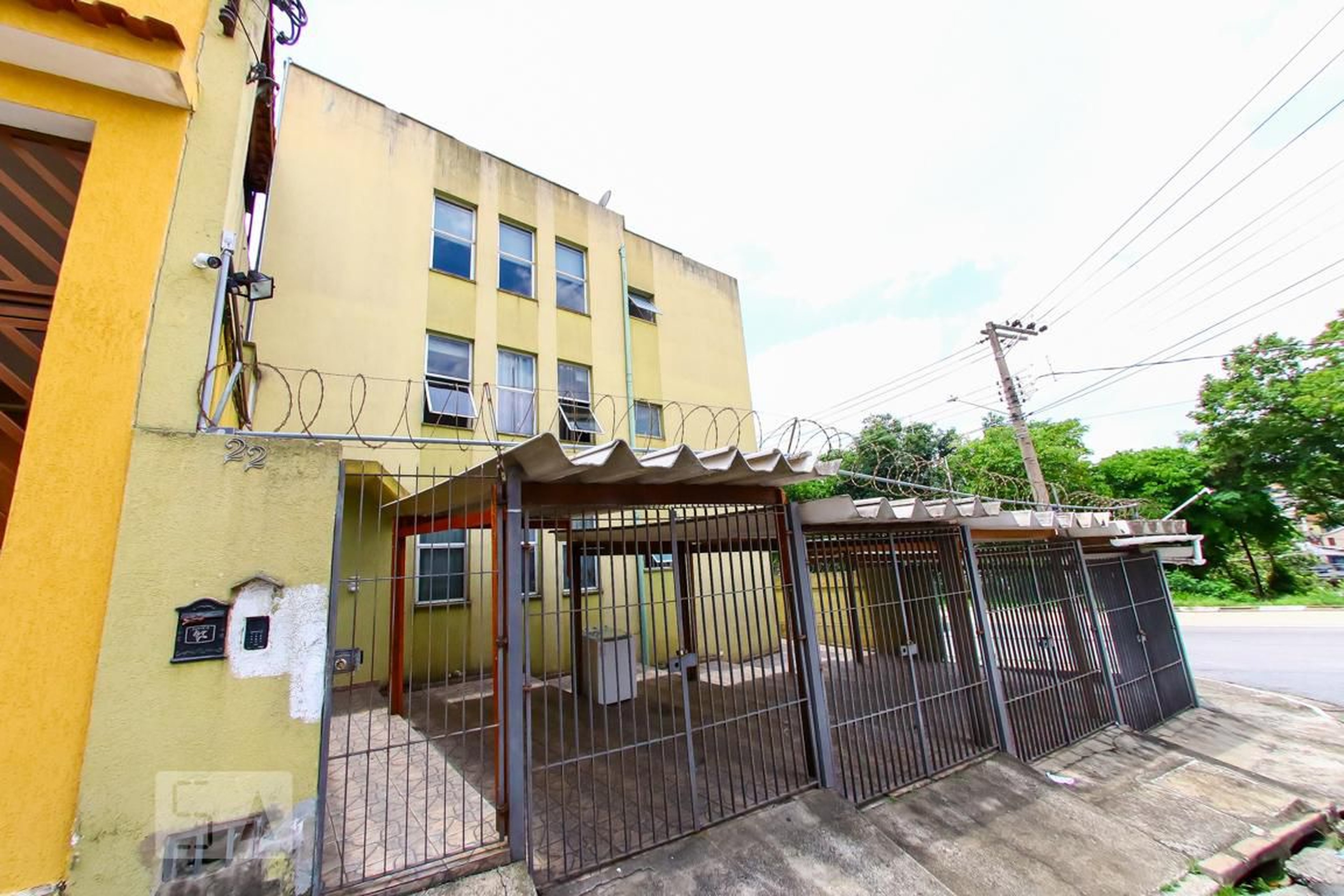 Fachada Condomínio em Rua Lourdes Rabello, 22