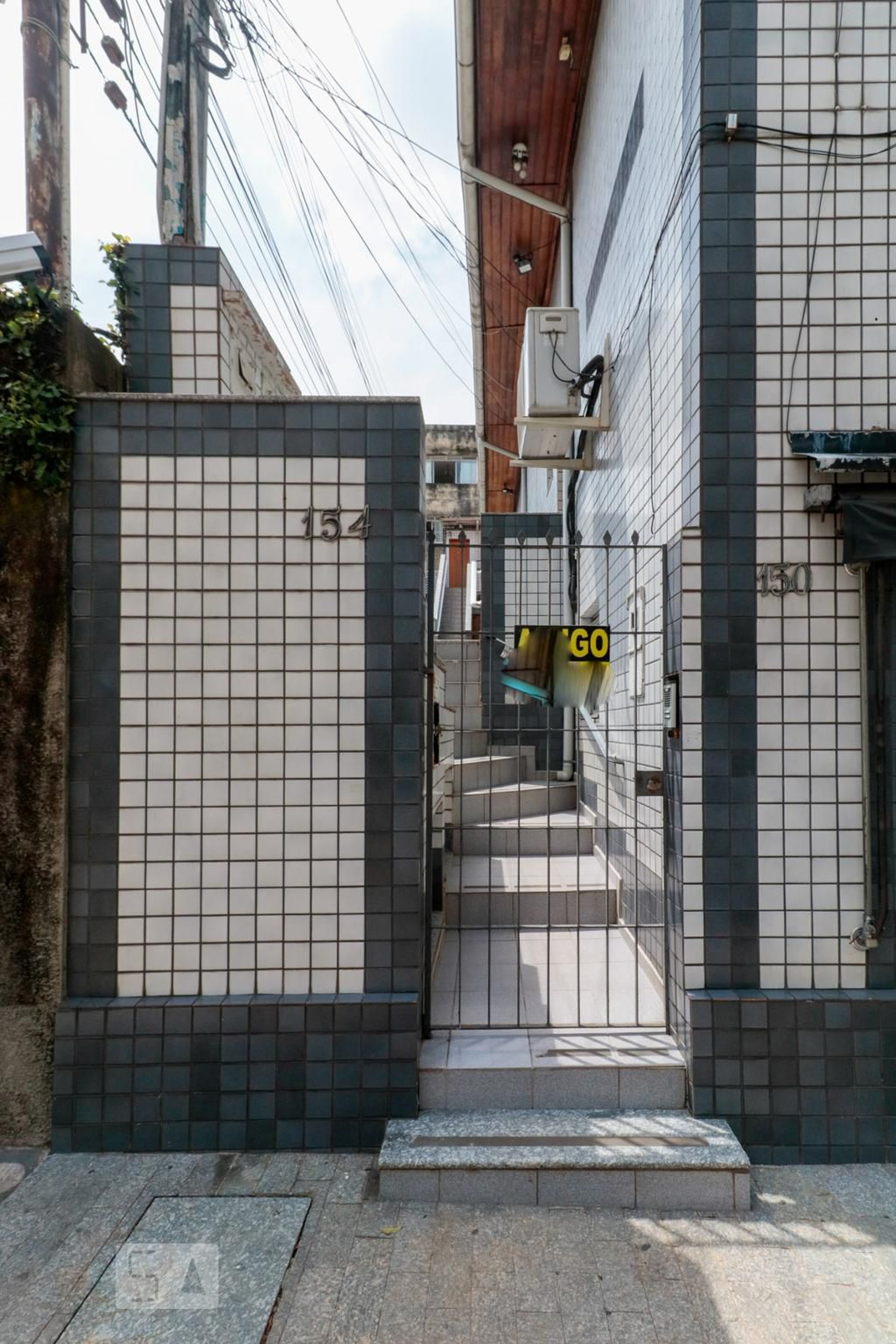 Fachada Condomínio em Rua Arruda Alvim, 154
