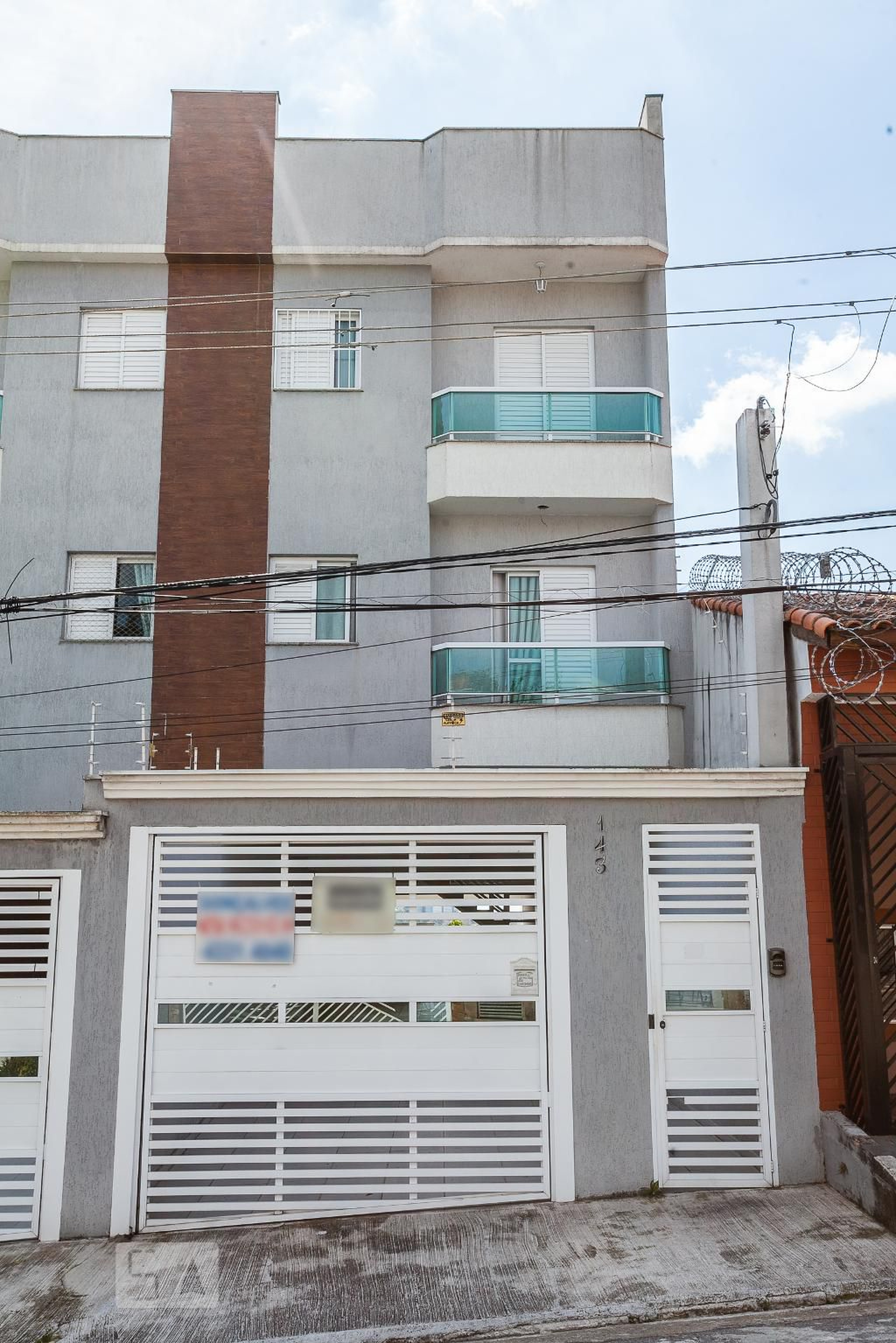 Fachada Condomínio em Rua Presidente Washington Luís, 143