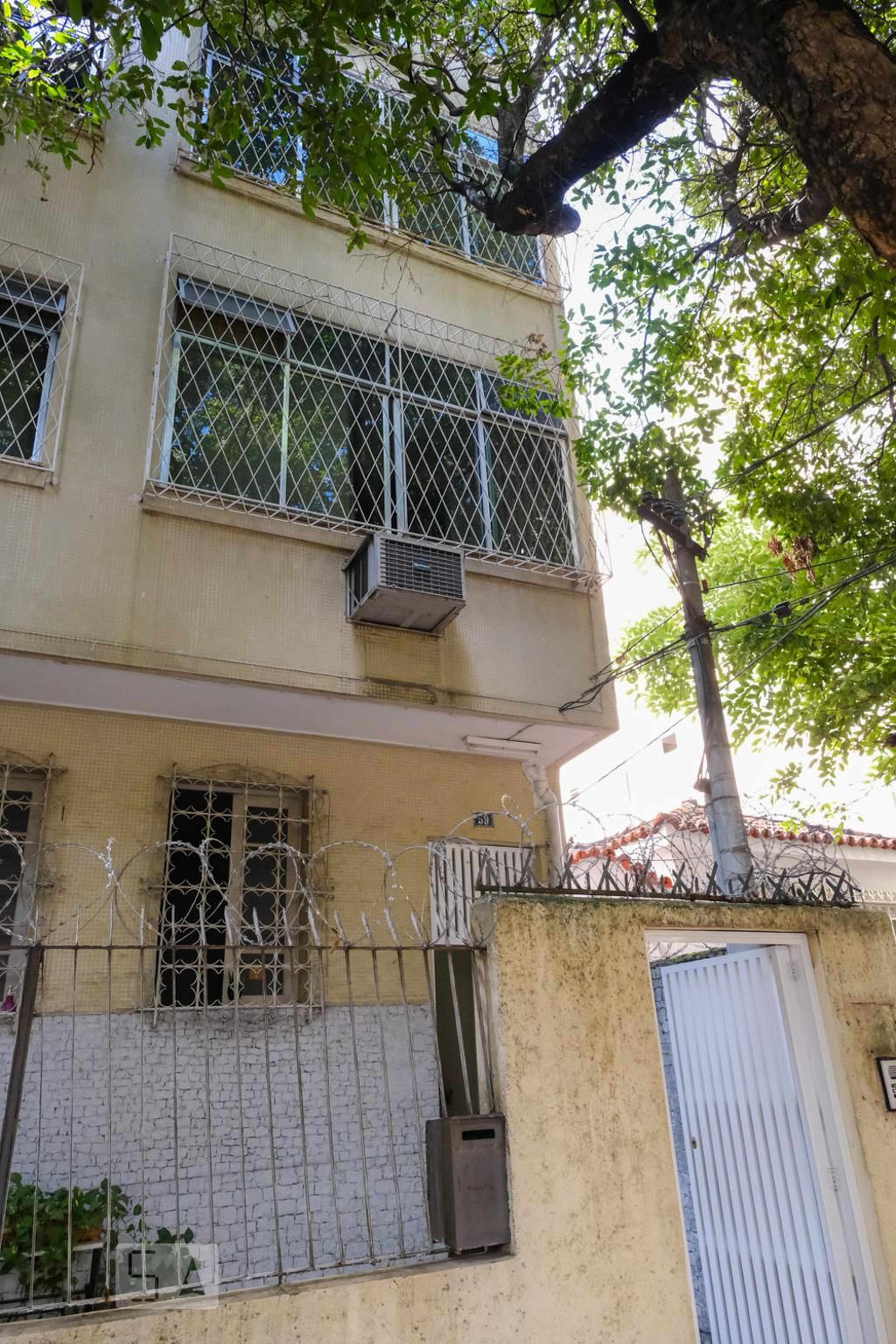 Fachada Condomínio em Rua Delgado de Carvalho, 59