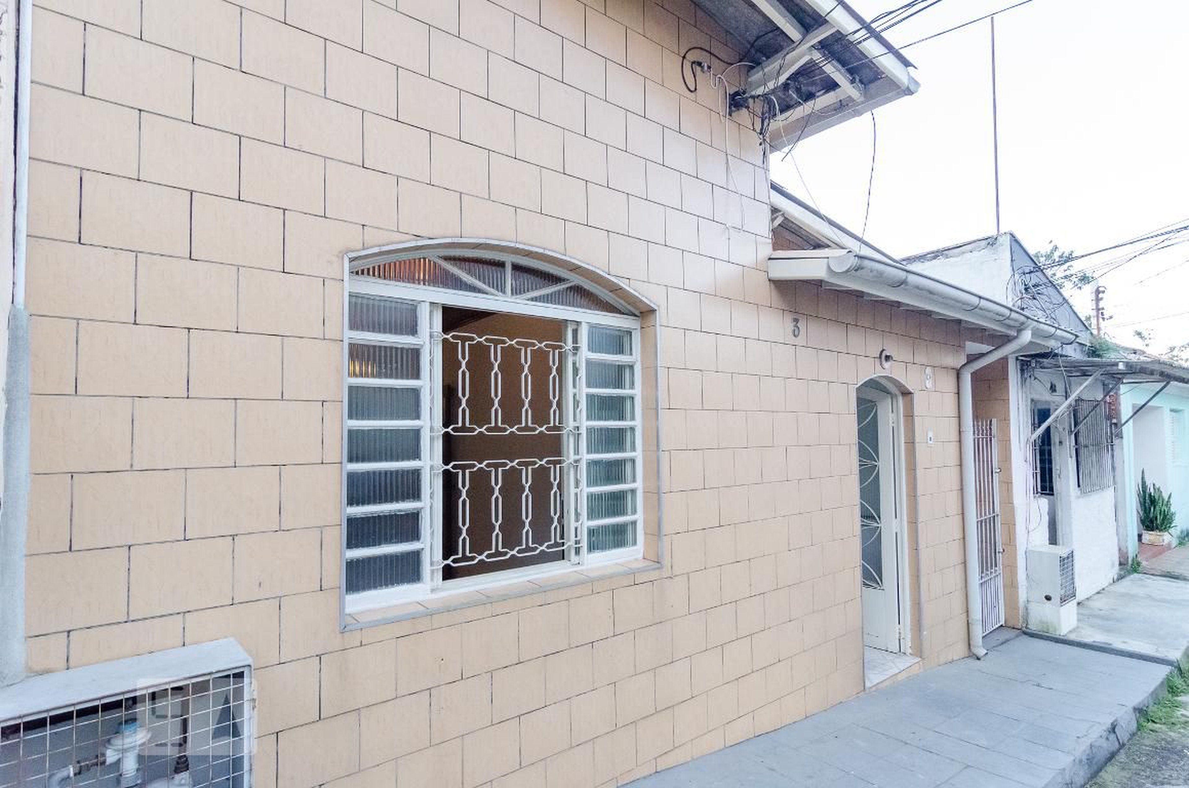 Fachada Condomínio em Rua das Pérolas, 85