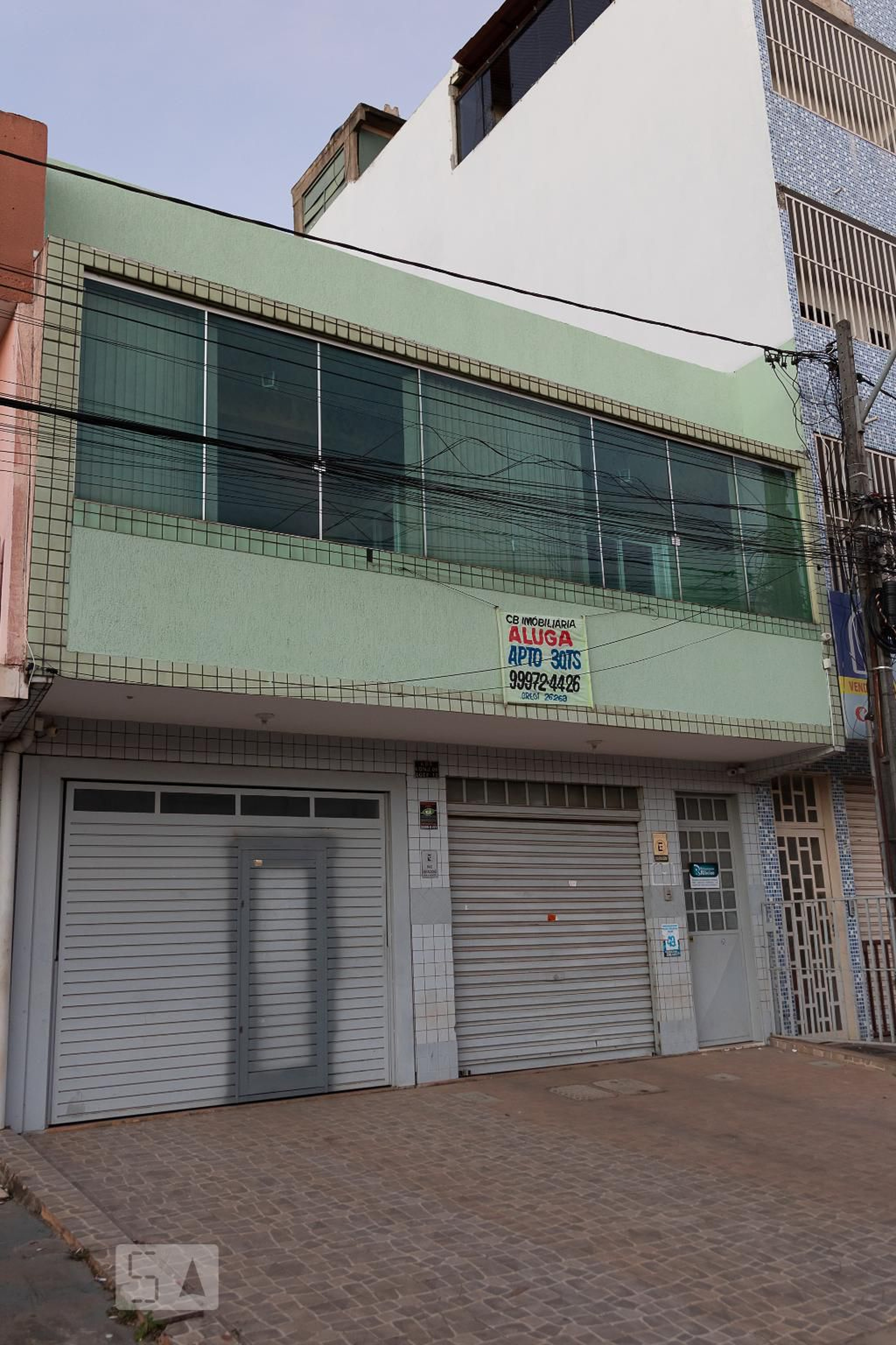 Fachada Condomínio em Ade Conjunto, 12