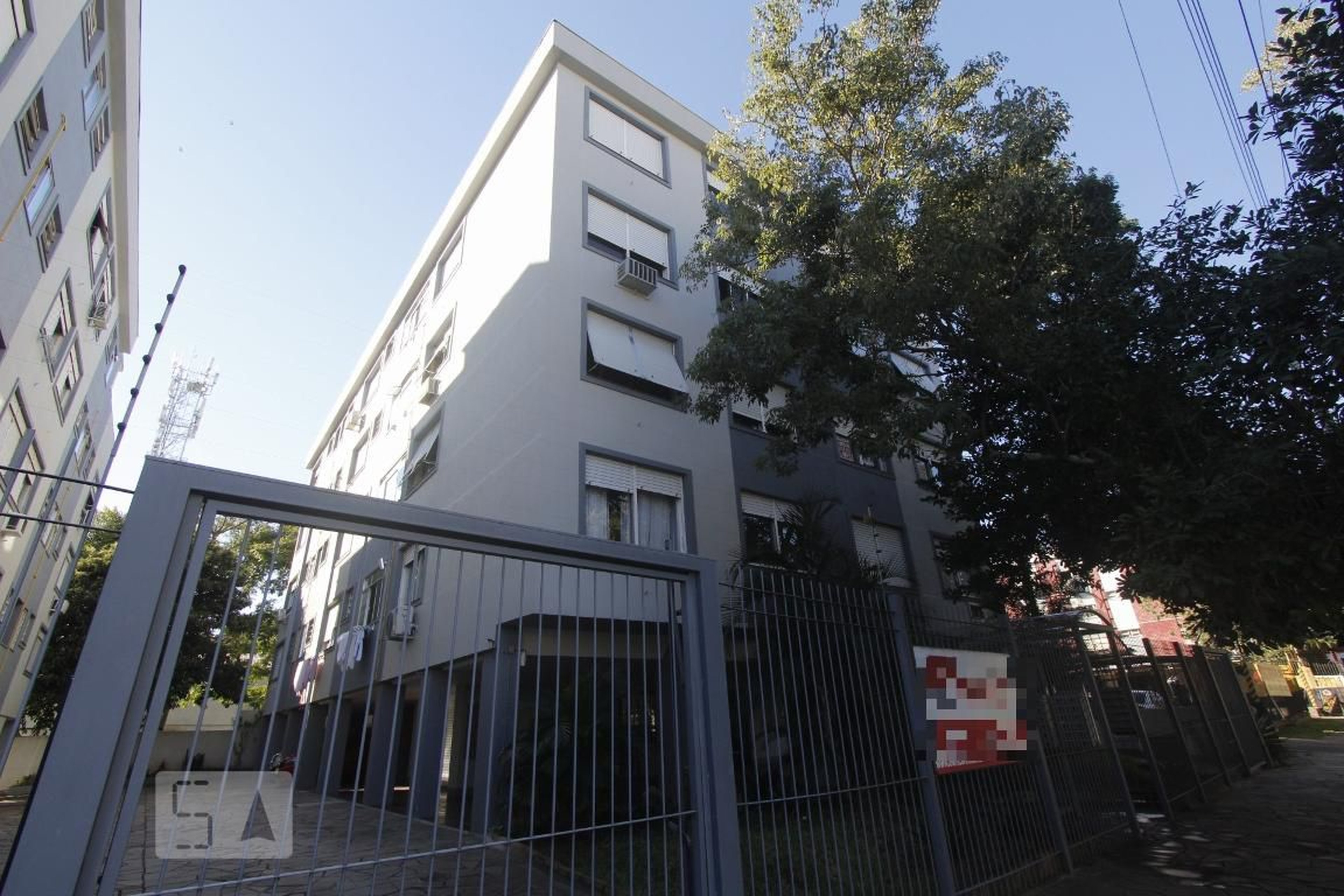 FACHADA Condomínio em Rua Tupinambá, 40