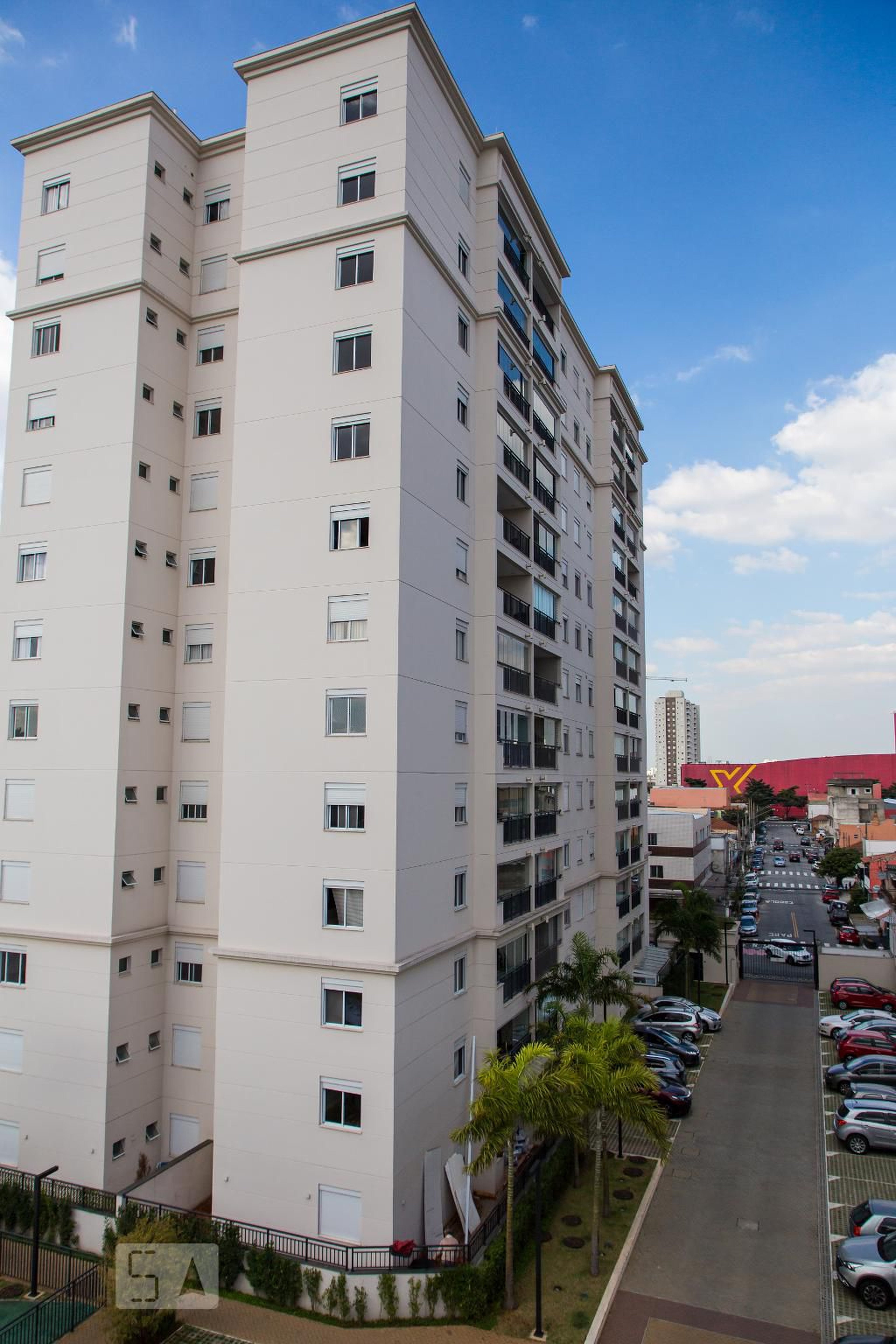 Fachada do Condomínio Condomínio Living da Vila