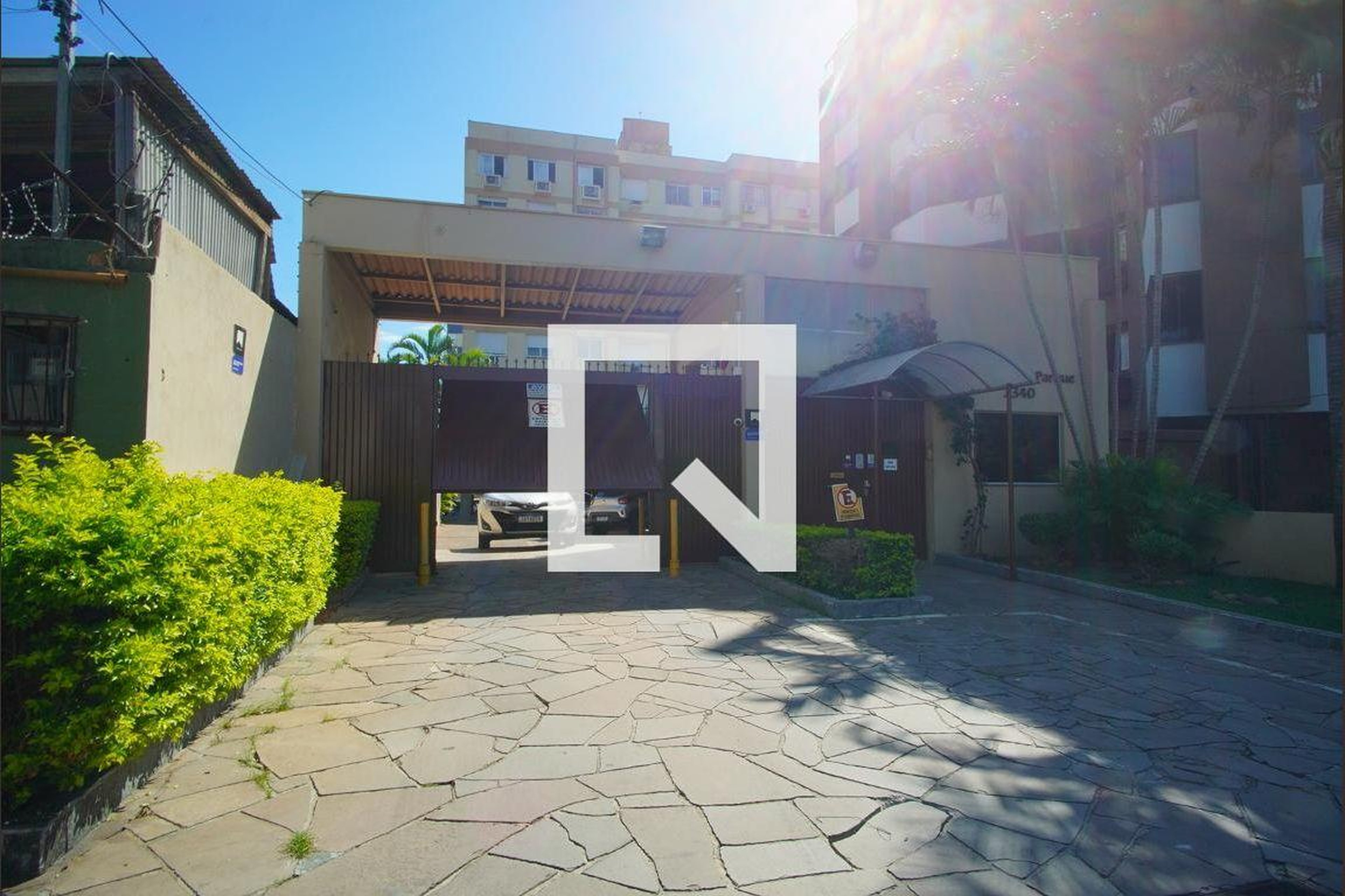 Fachada do Condomínio Condomínio Vivendas do Parque