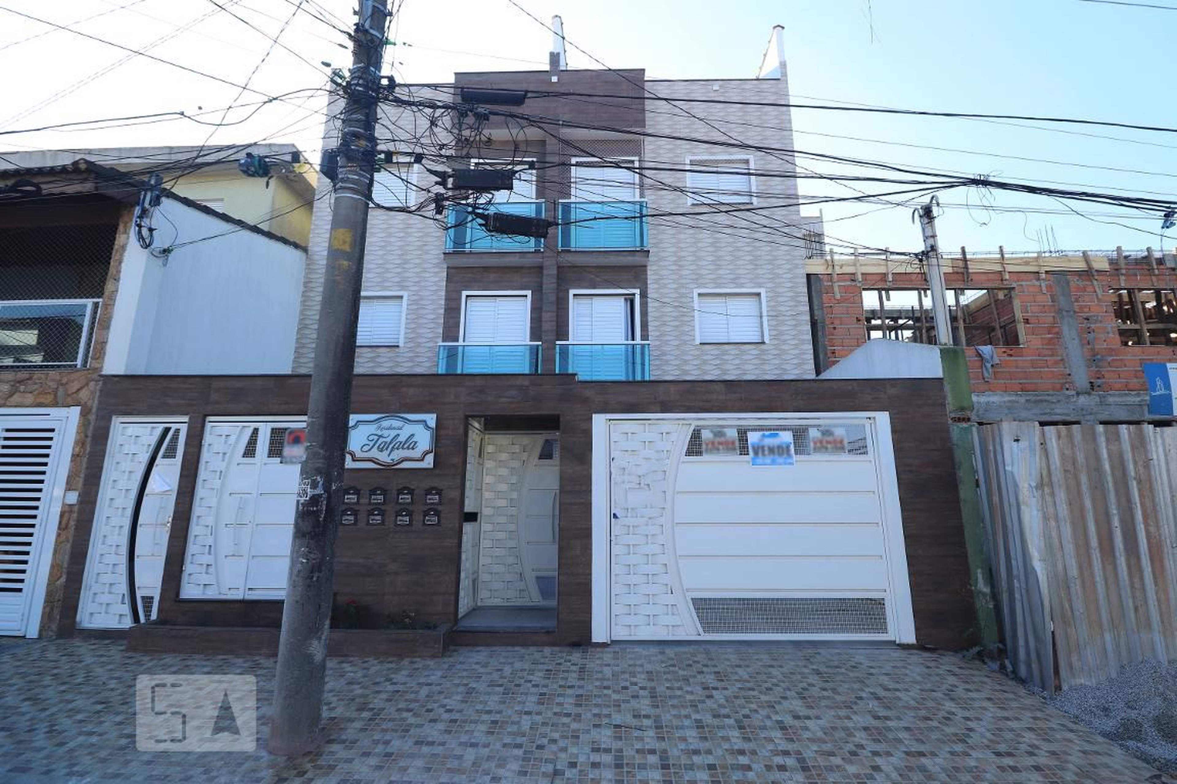 Fachada Condomínio em Rua Asclepias, 170