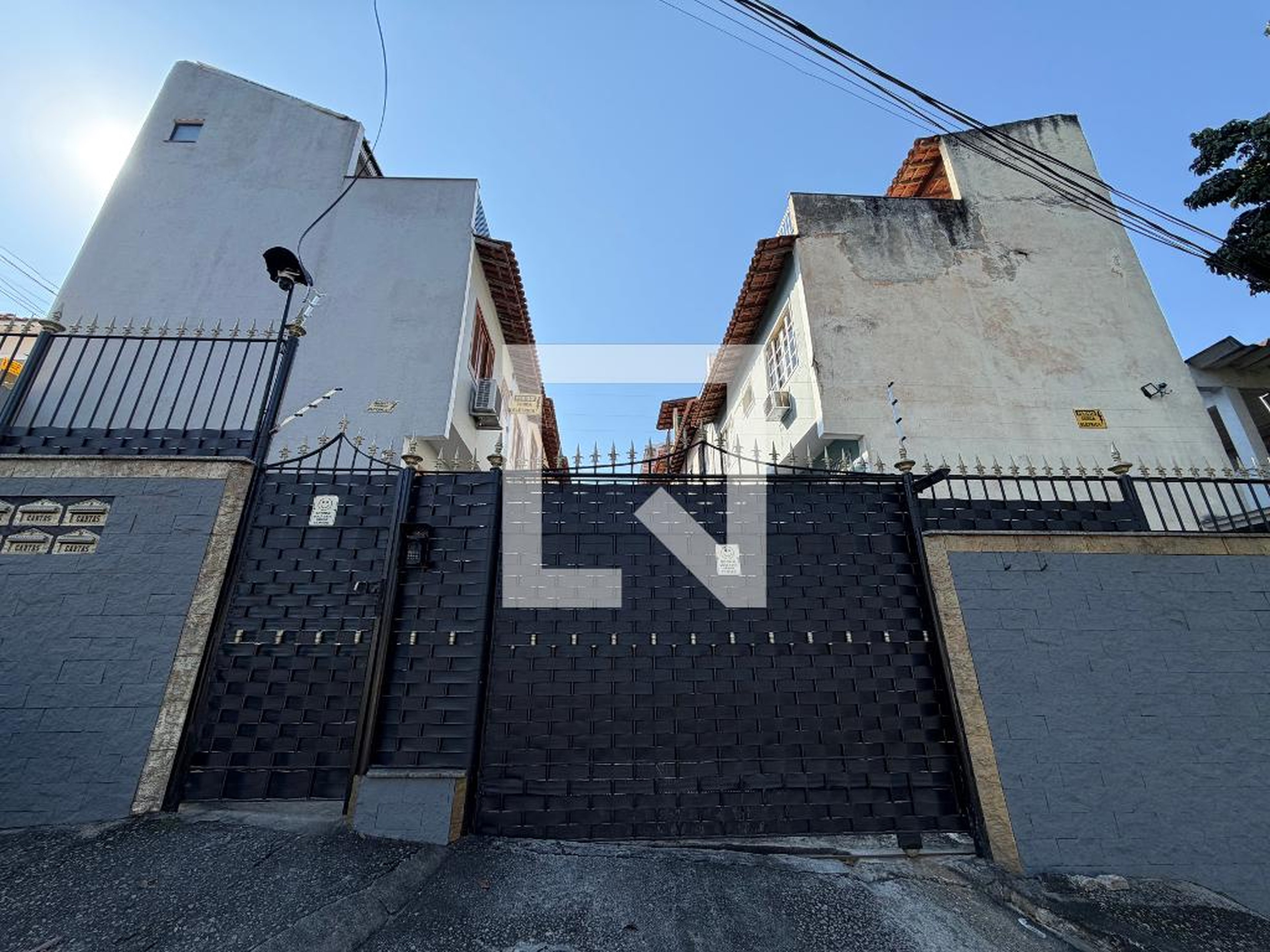 Fachada Condomínio em Rua Paturi, 675