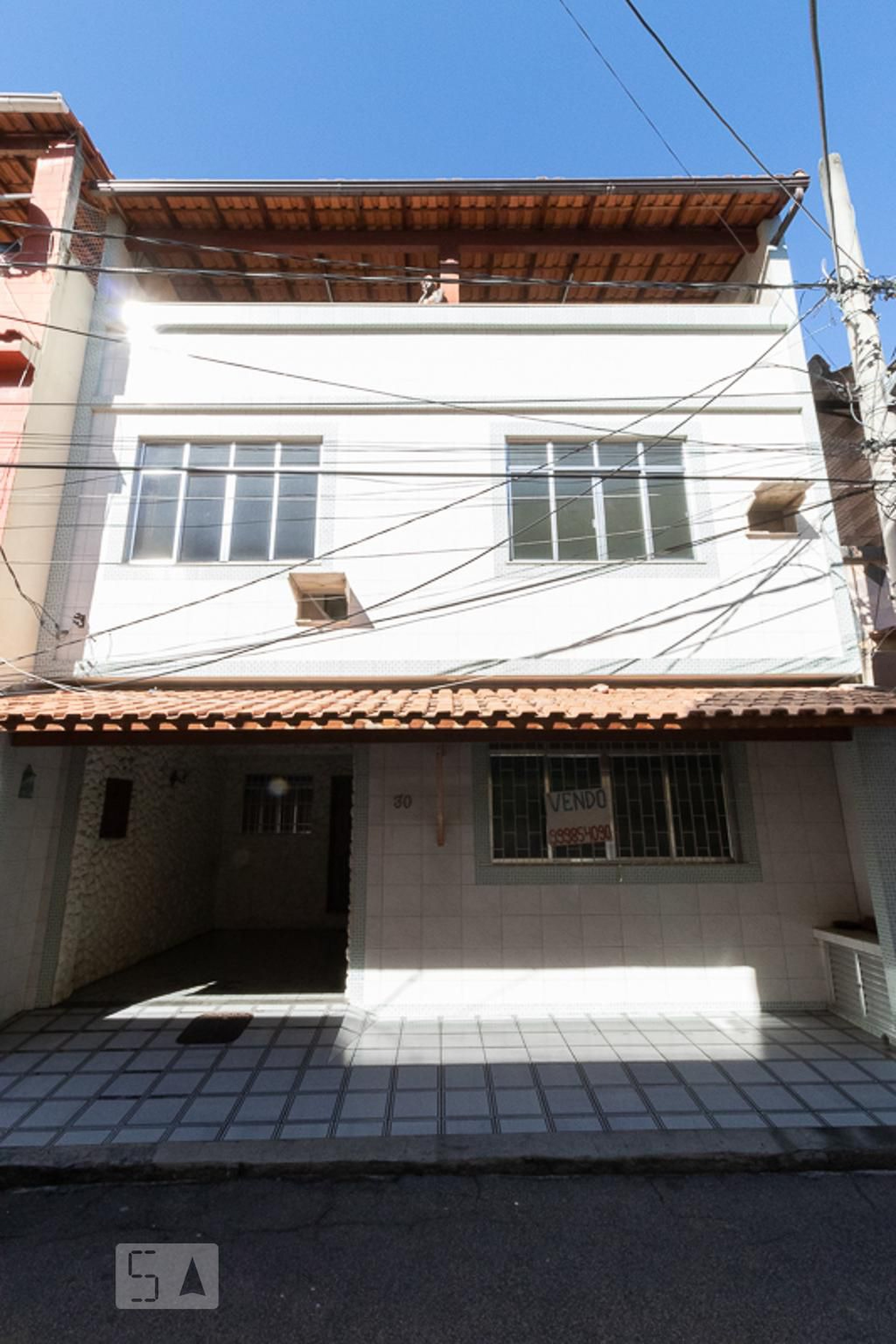 Fachada Condomínio em Rua Clarimundo de Melo, 246