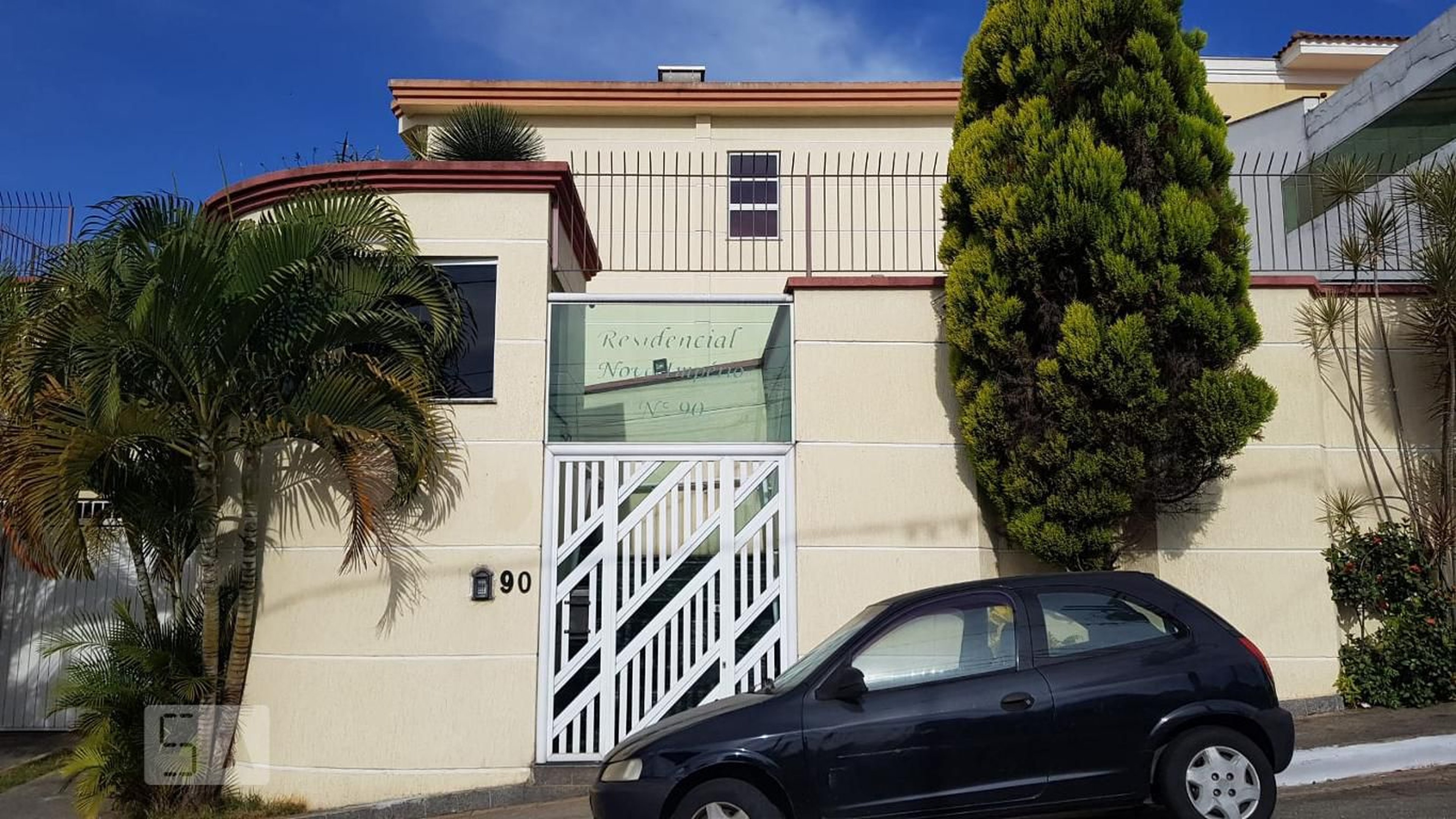 Fachada Condomínio em Rua Coronel Vieira de Castro, 90