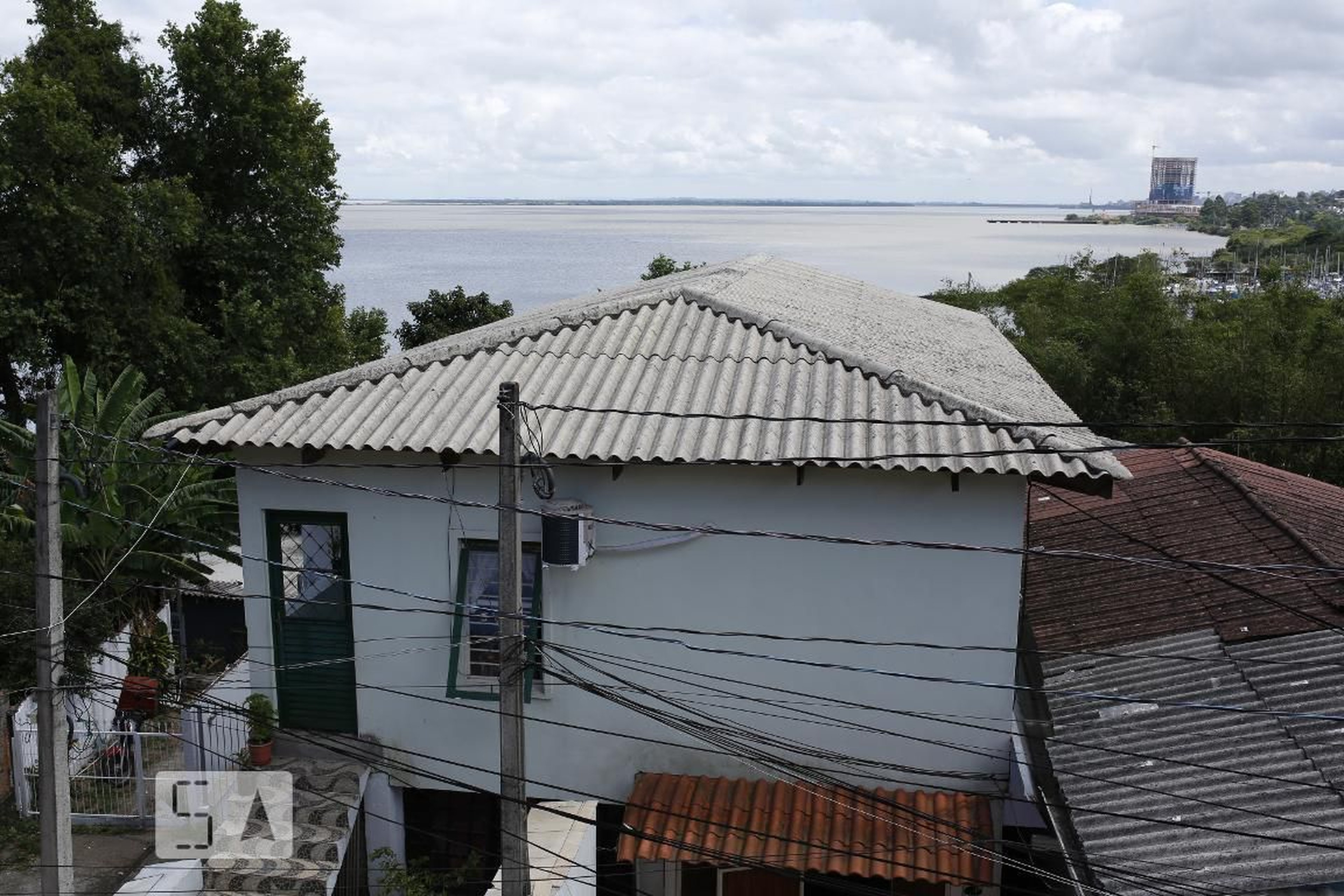 Fachada Condomínio em Rua Bororó, 4