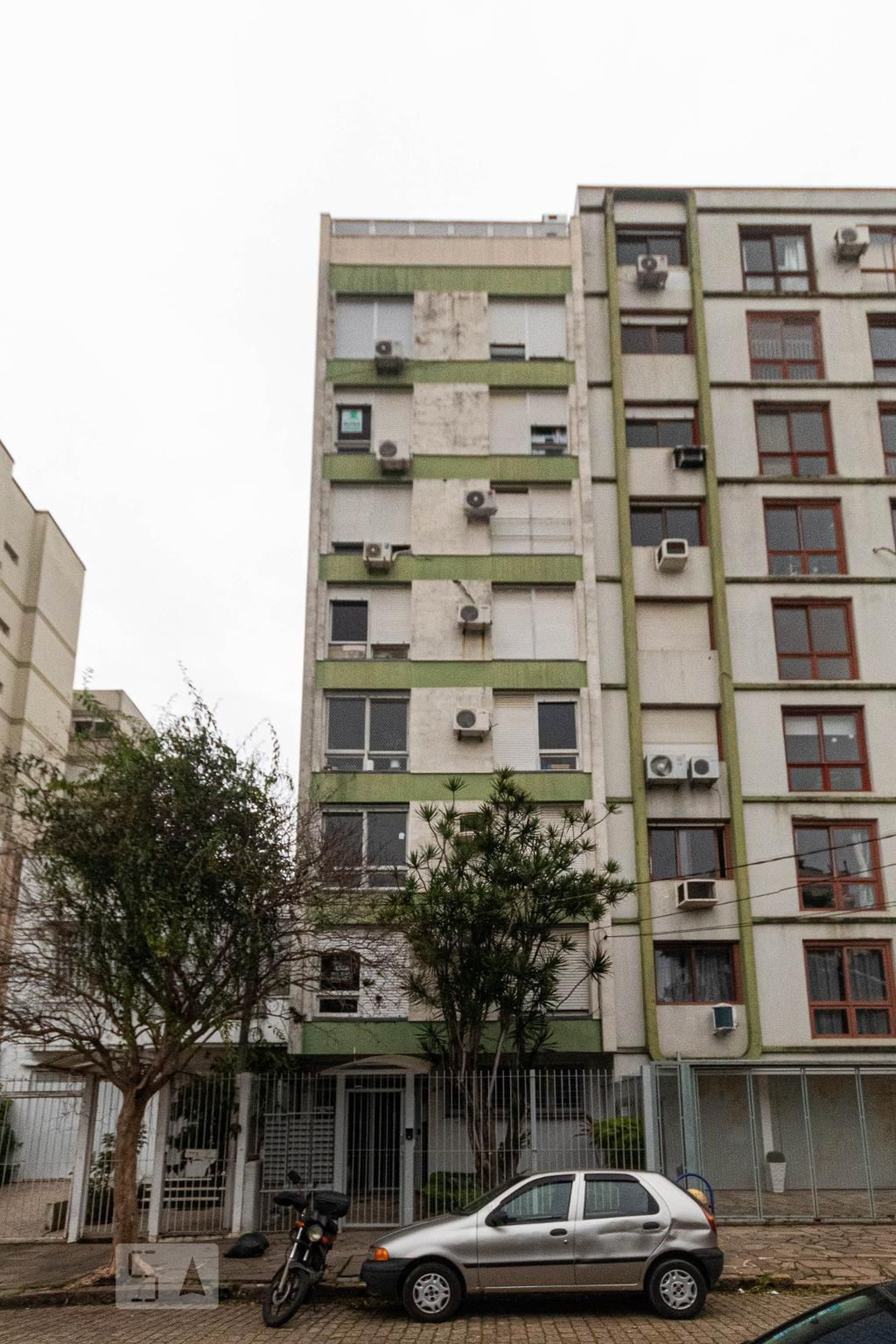 Fachada do Condomínio Condomínio Petit Village