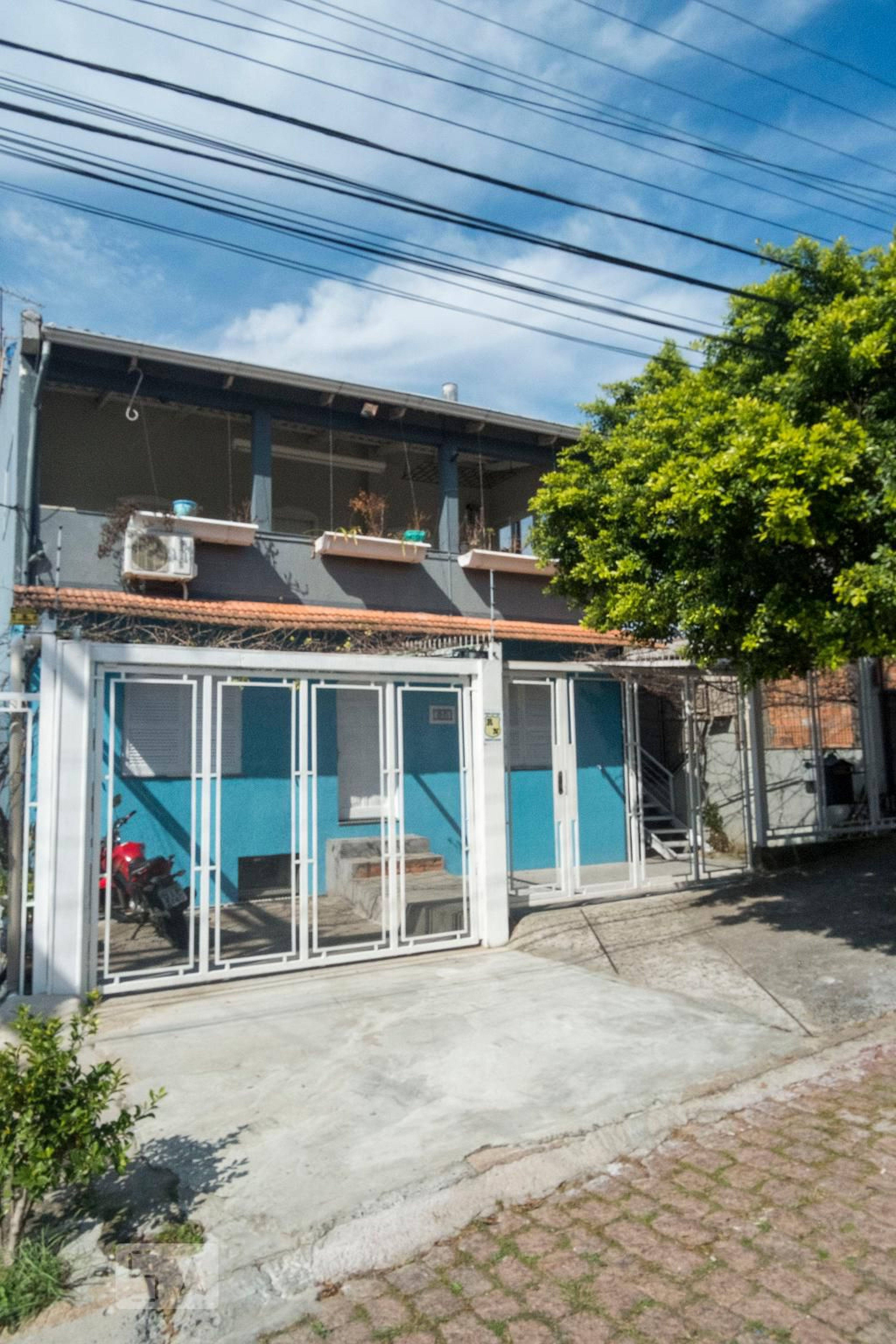 Fachada Condomínio em Rua Homem de Melo, 86