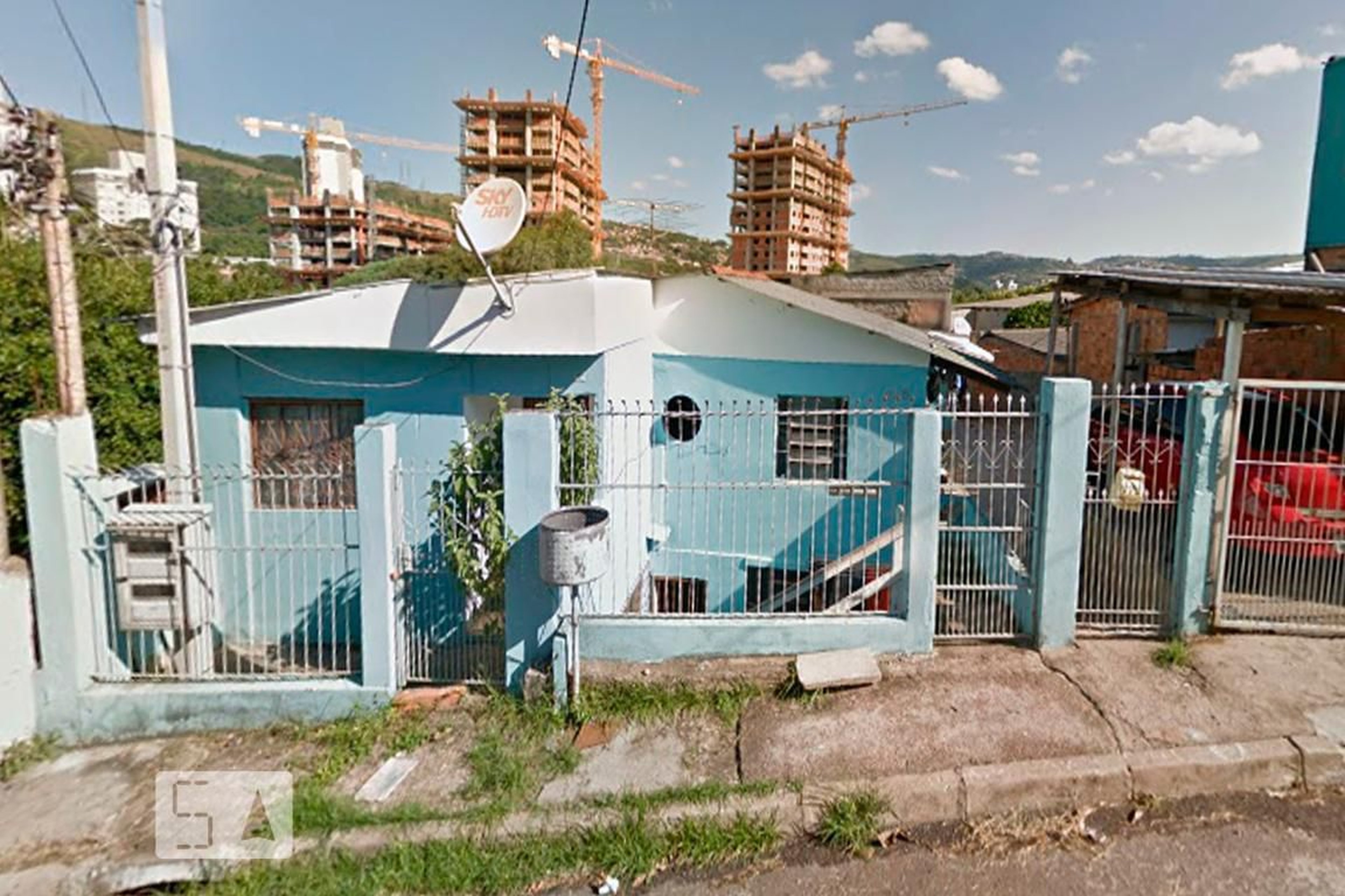 Fachada Condomínio em Rua Engenheiro José Ângelo Bettega Cassol, 249