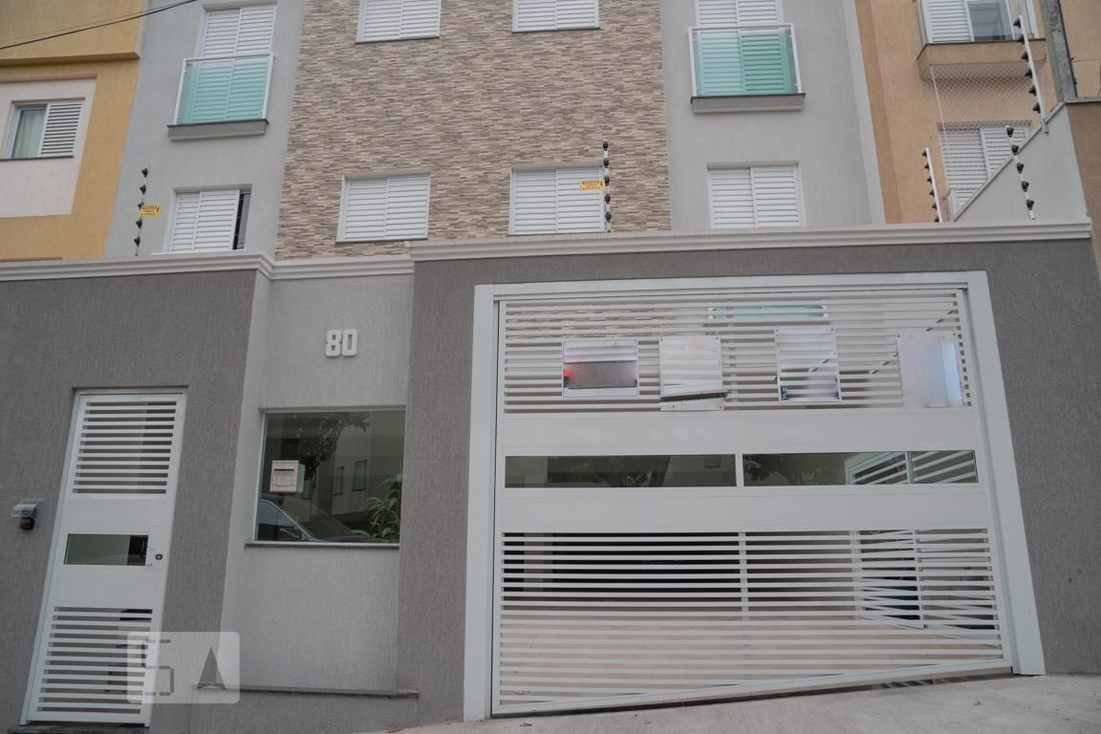 Fachada Condomínio em Rua Catigua, 80