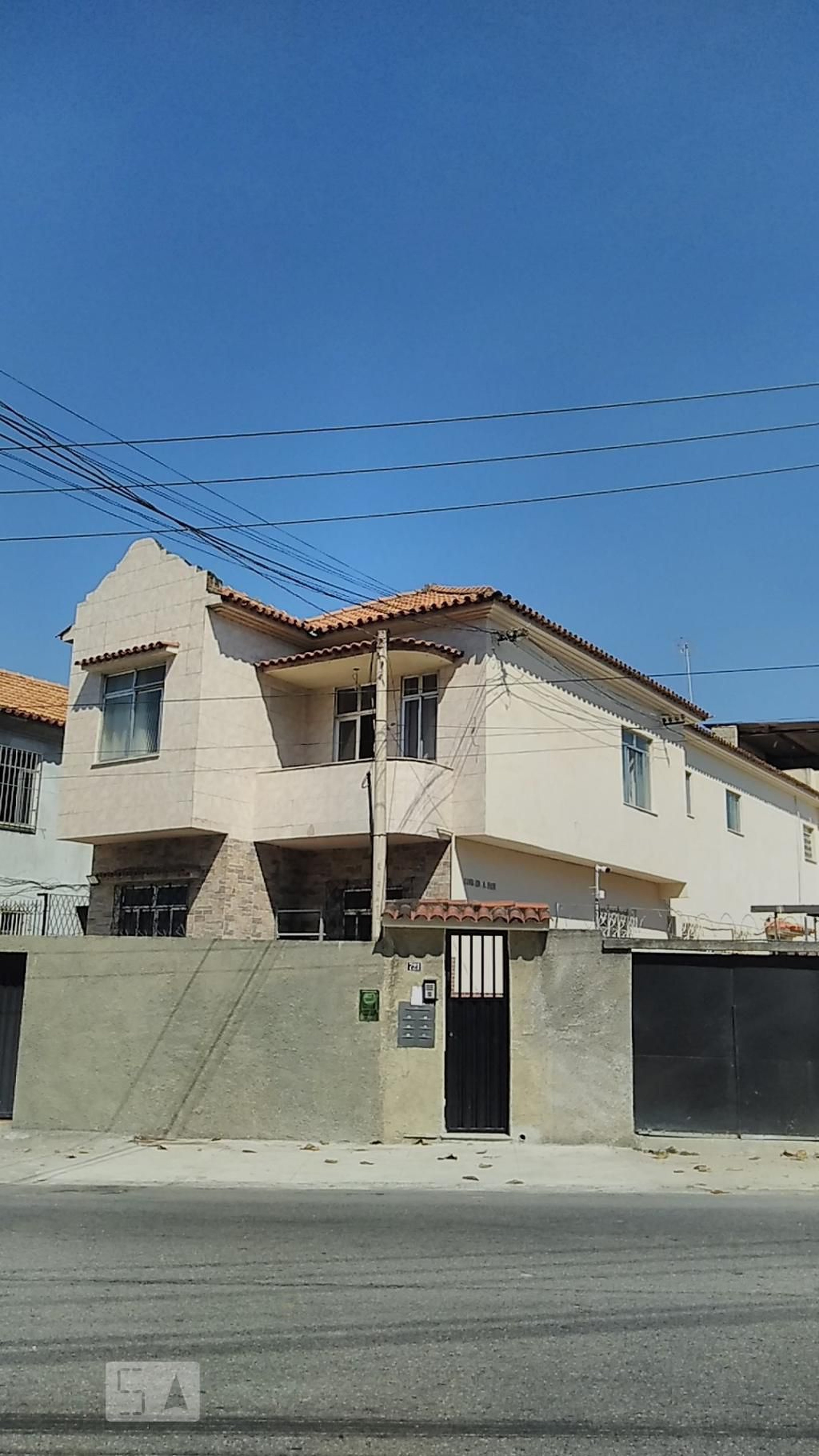 Fachada Condomínio em Rua Leopoldina Rego, 721