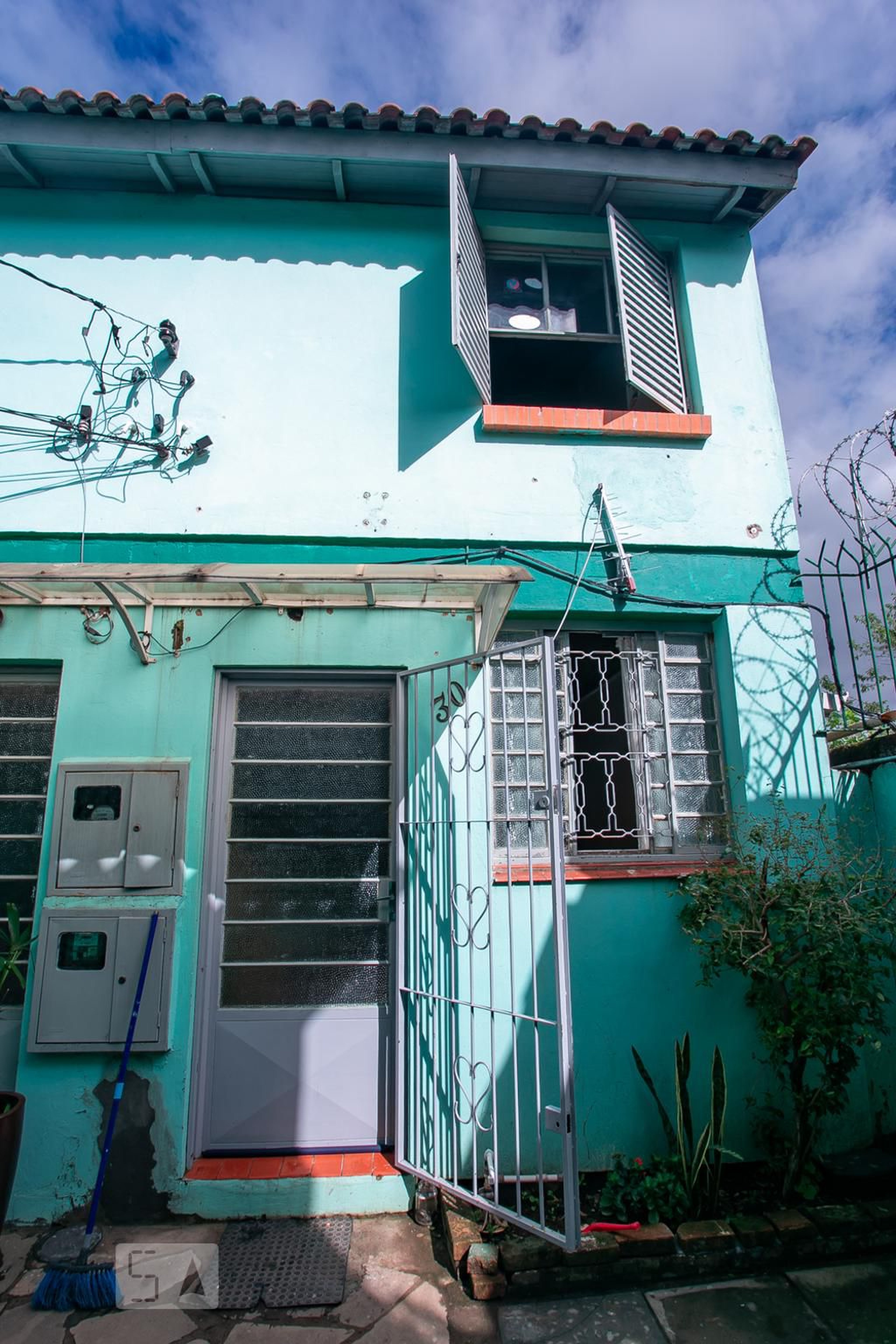 Fachada Condomínio em Rua Deputado Cunha Bueno, 215