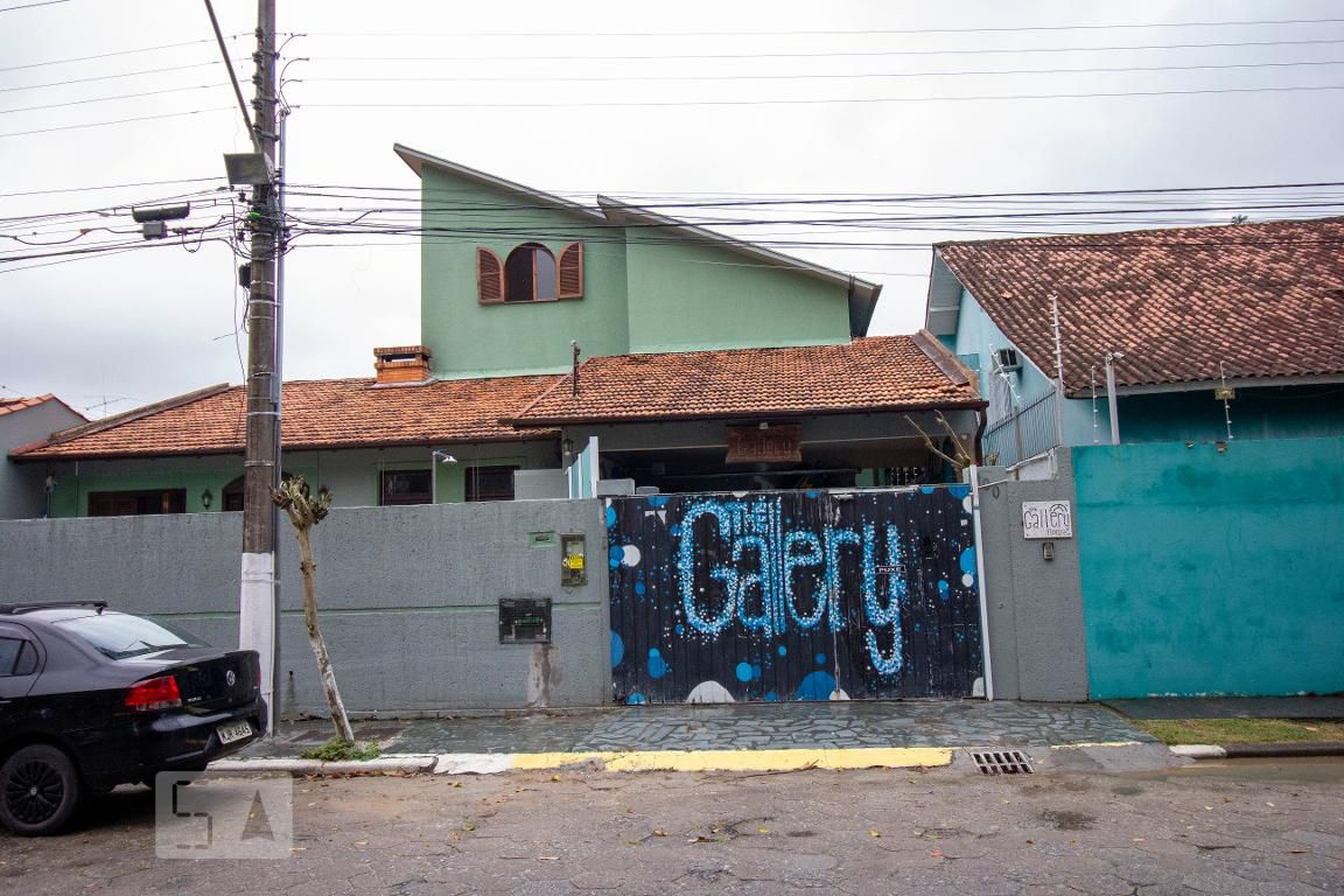 Fachada Condomínio em Rua Euríco Hosterno, 100