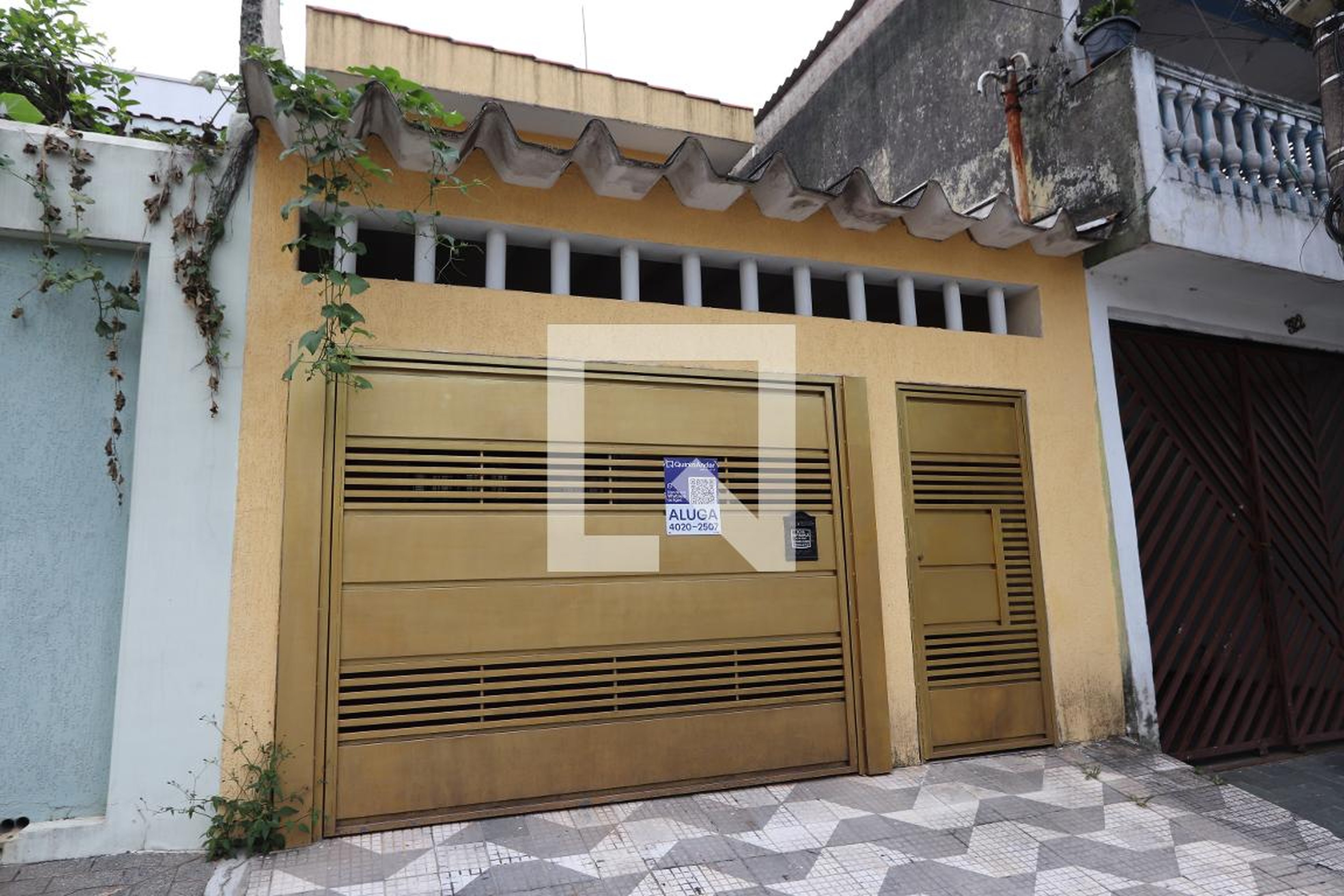 Fachada Condomínio em Rua Flávio Tambellini, 326